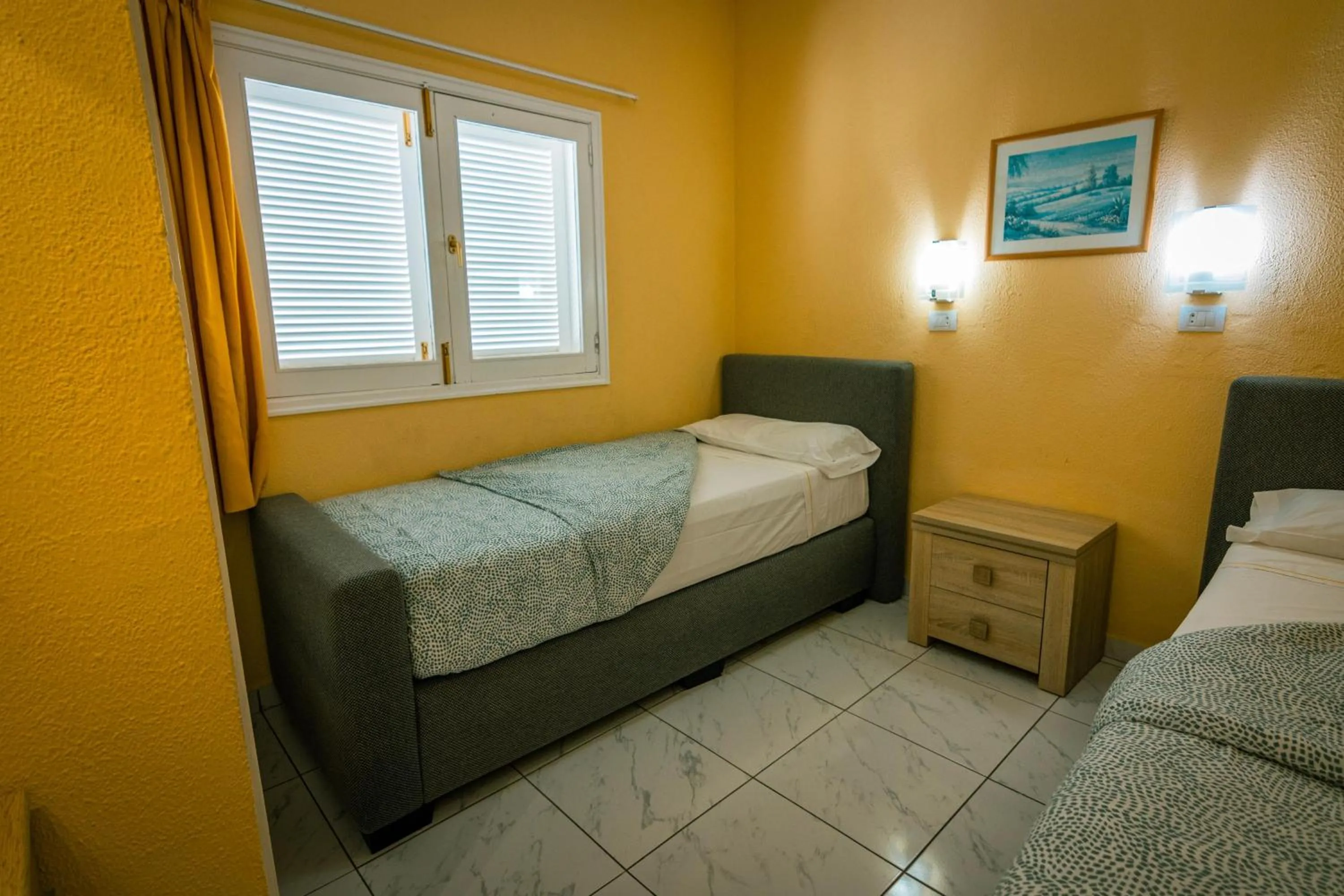 Bed in Aparthotel MONTERREY