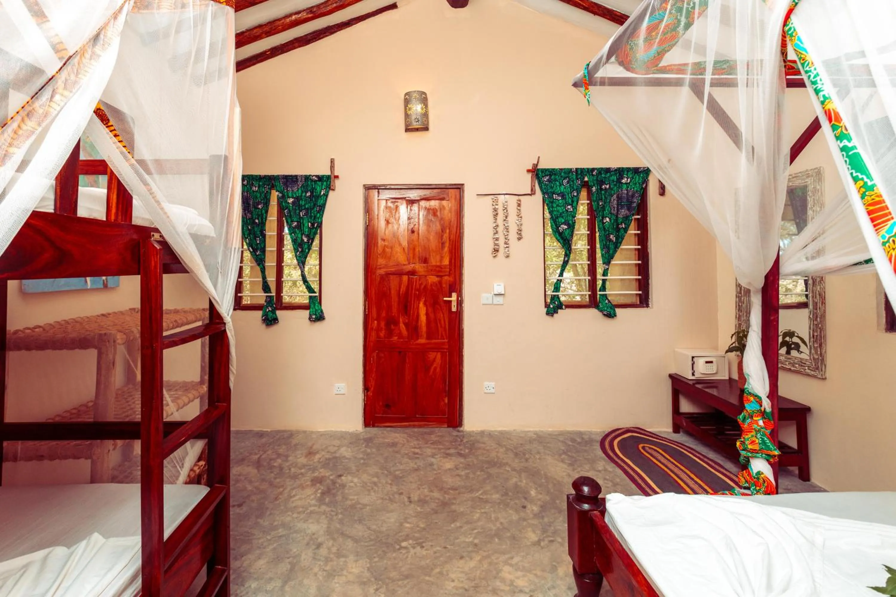 Photo of the whole room, Bed in Demani Lodge Zanzibar