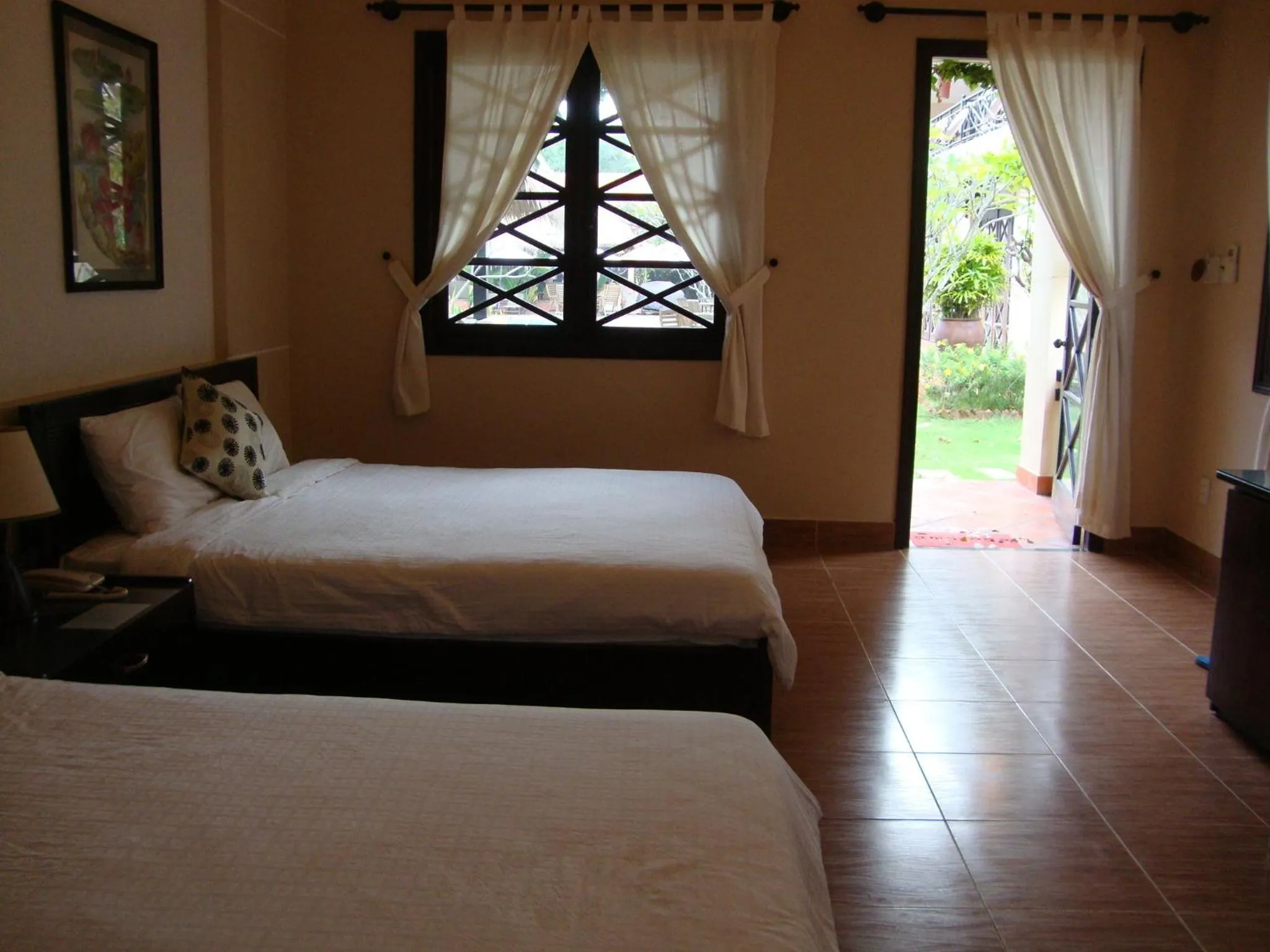 Balcony/Terrace, Bed in Orchid Boutique Beach Resort