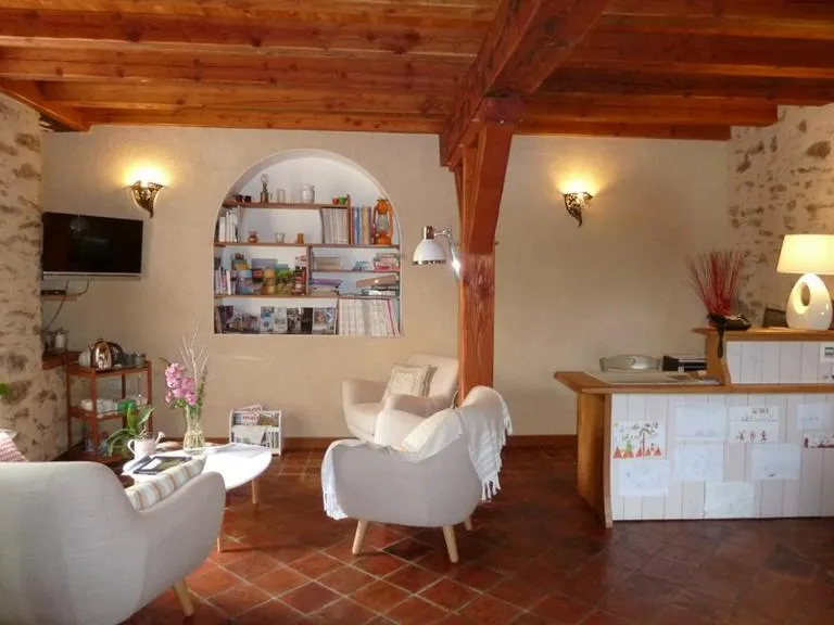 Communal lounge/ TV room in Le Moulin de Drapras