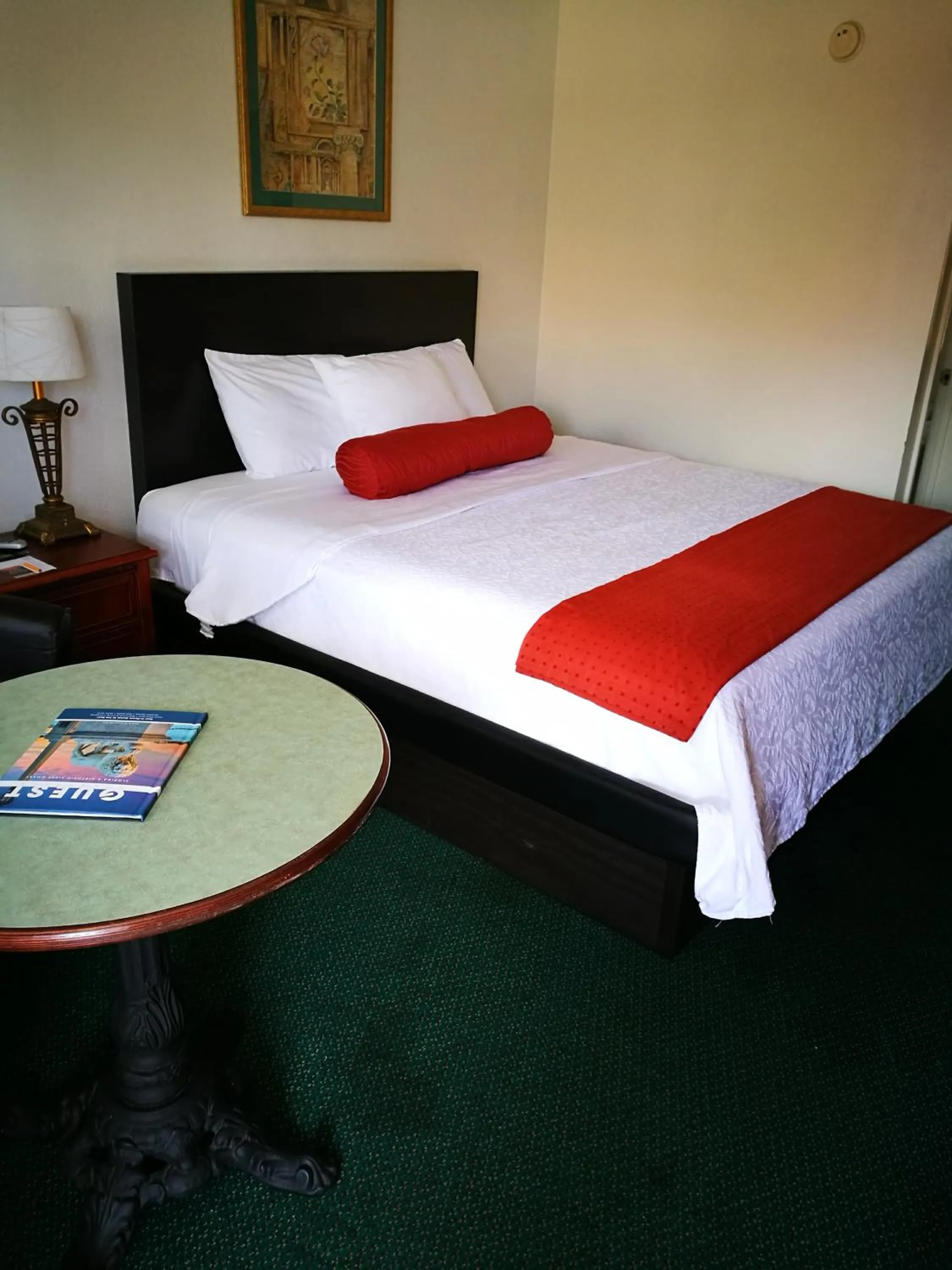 Bed in Merida Inn & Suites