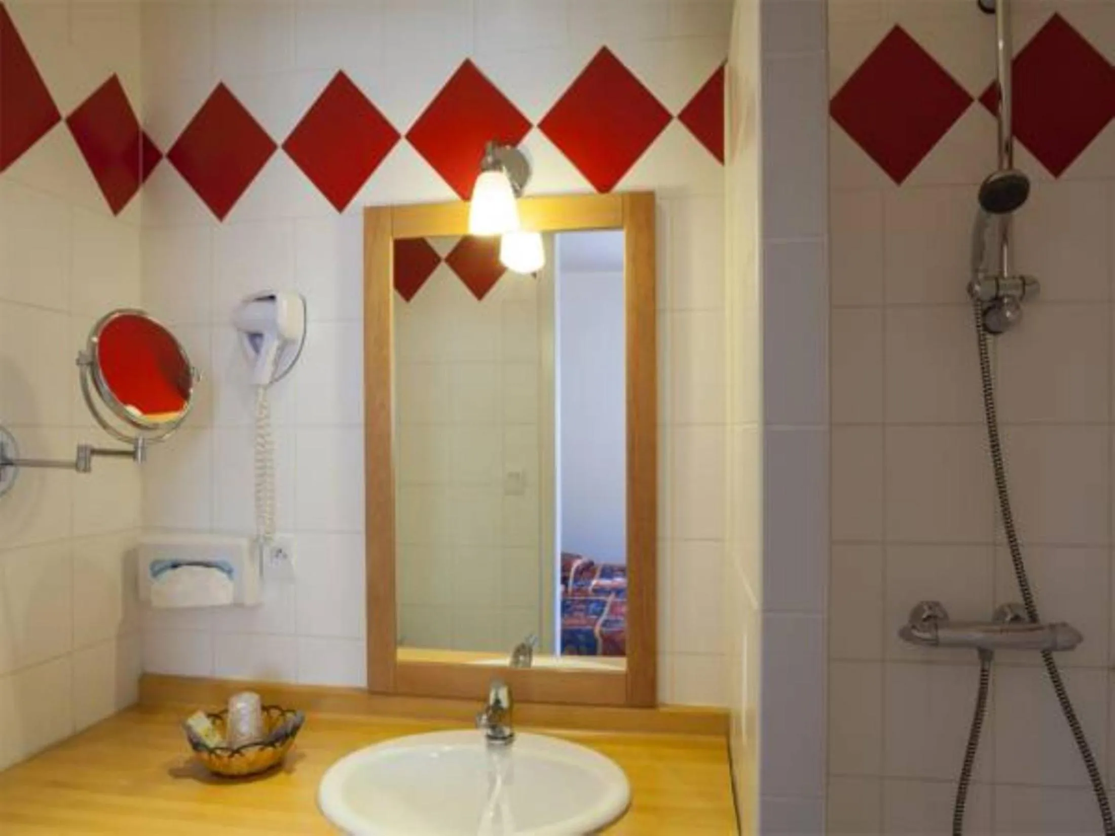 Bathroom in Le Chalet de la Foret Hôtel 3 étoiles et Restaurant