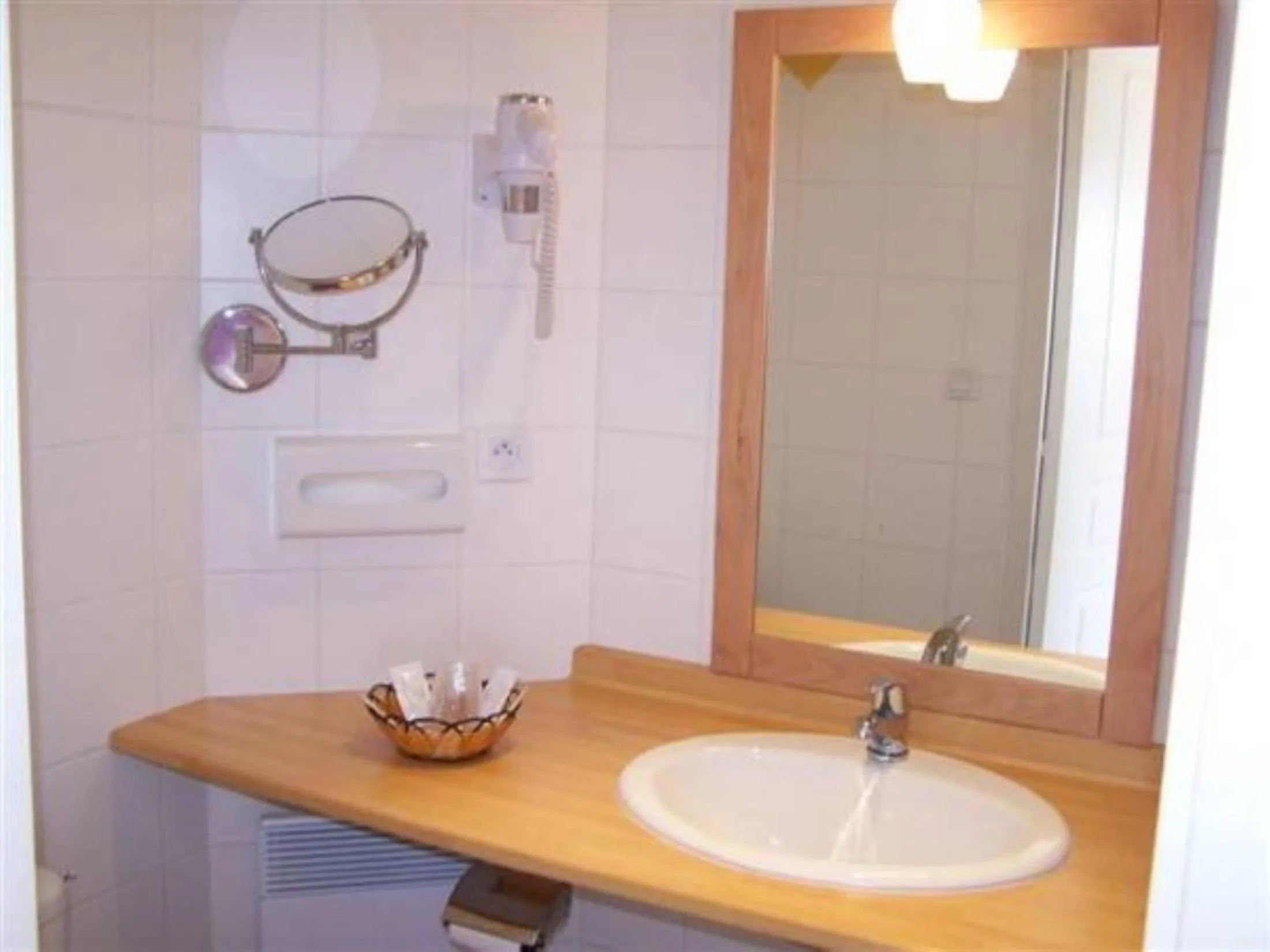 Bathroom in Le Chalet de la Foret Hôtel 3 étoiles et Restaurant