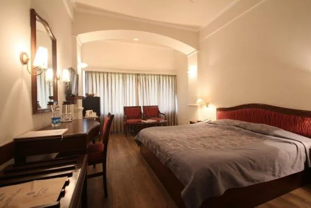 Communal lounge/ TV room in Hotel Crystal Palace Meerut