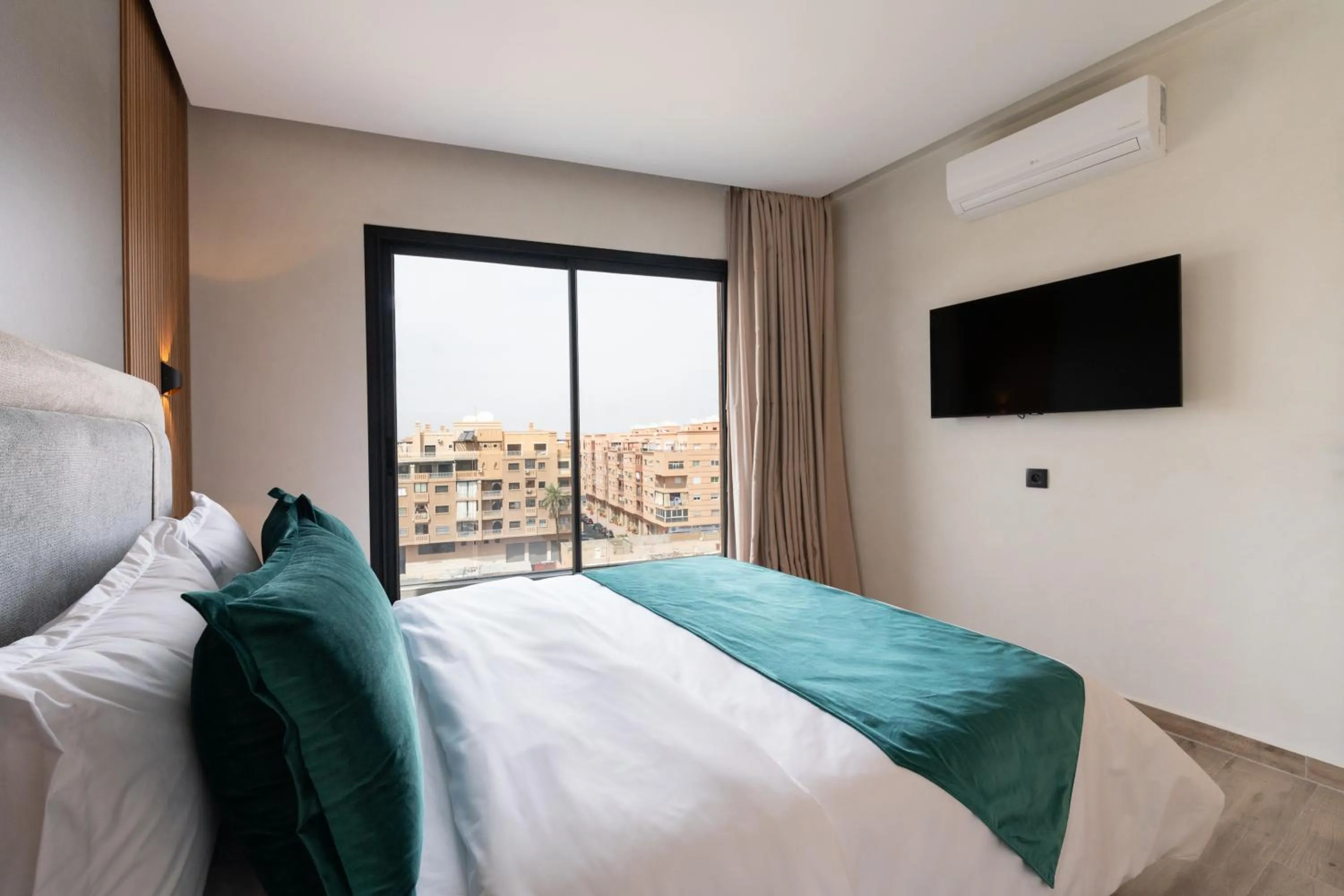 Bed in Appart Hôtel Rambla