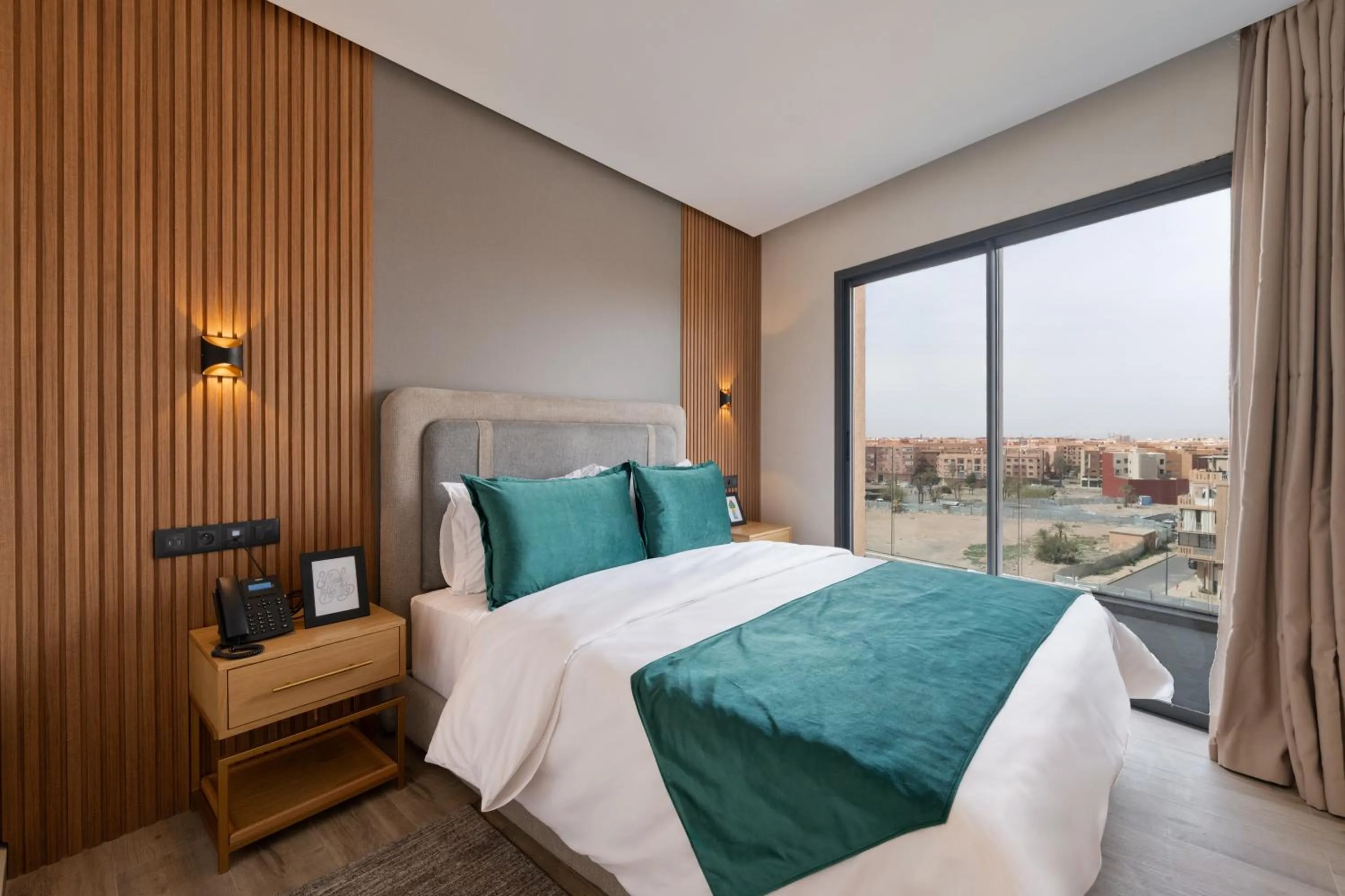 Bed in Appart Hôtel Rambla