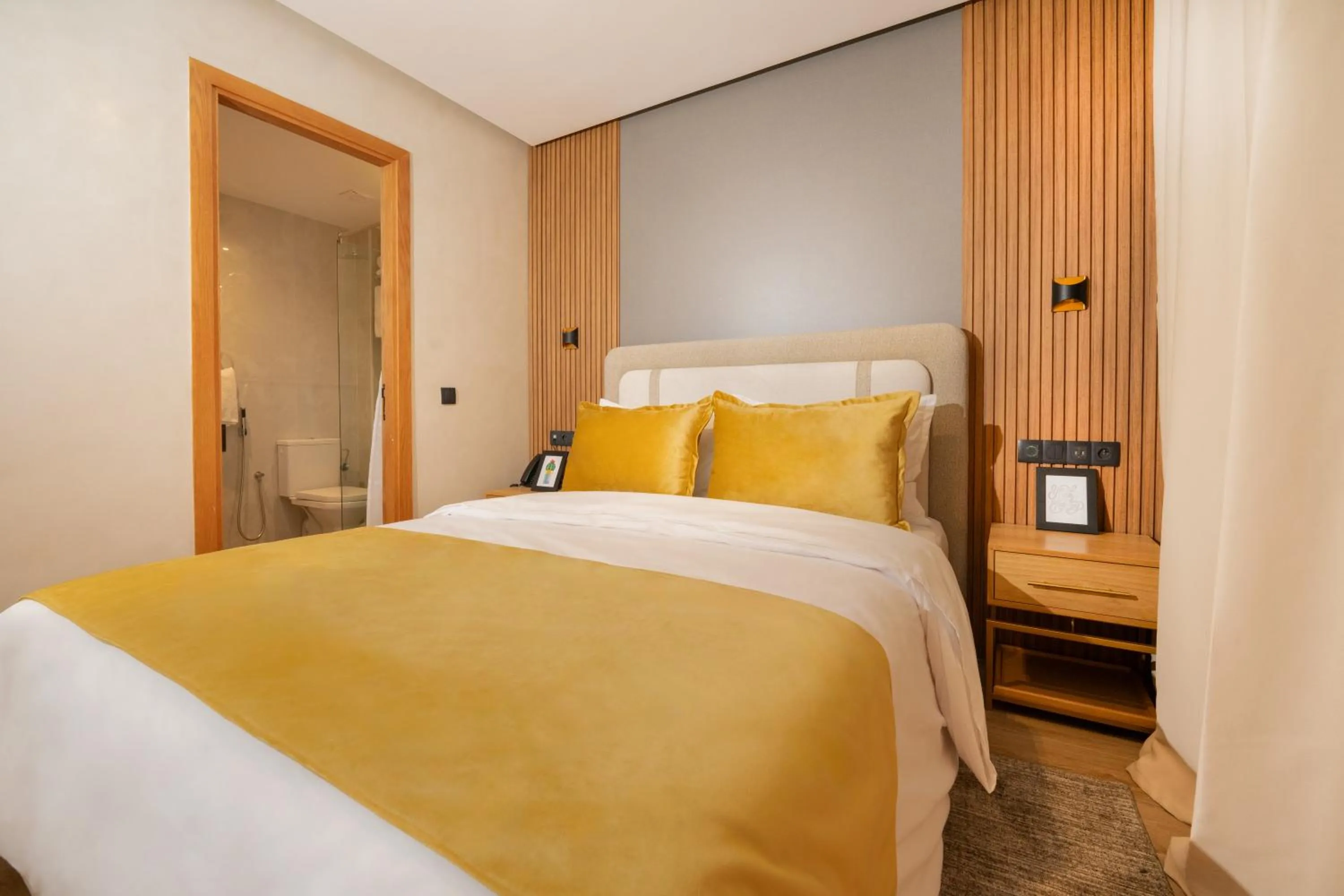 Bed in Appart Hôtel Rambla