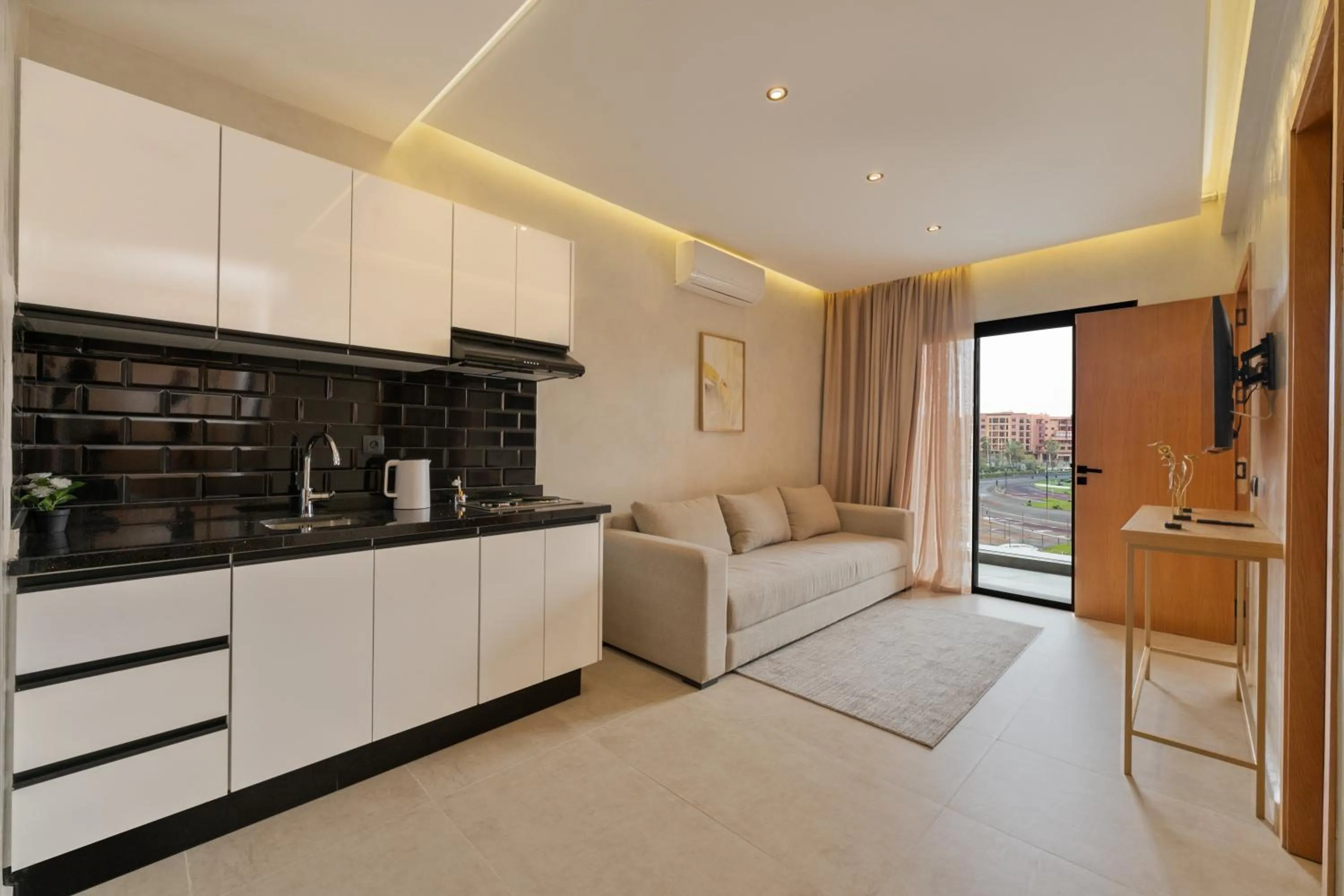 Kitchen or kitchenette in Appart Hôtel Rambla