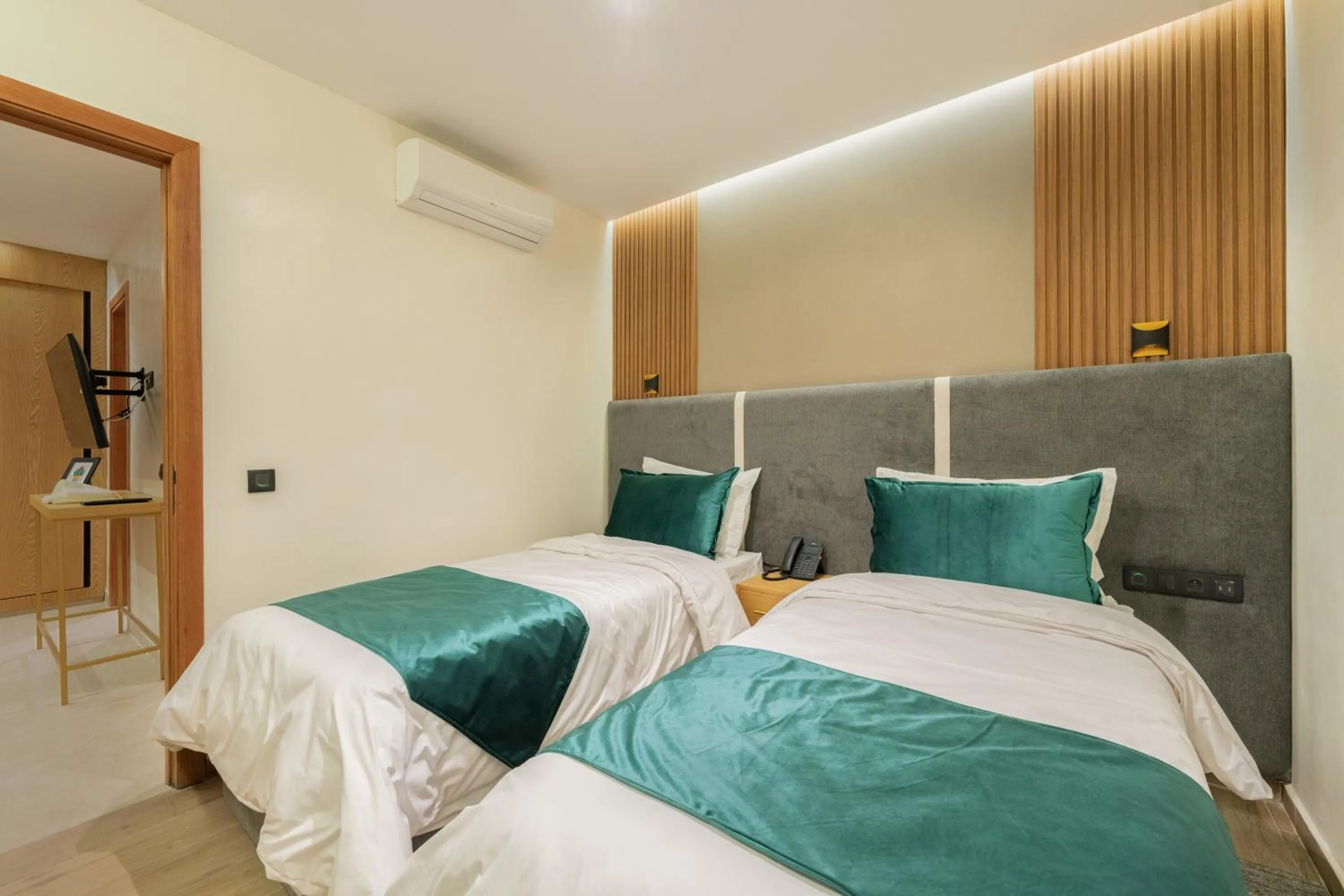 Bed in Appart Hôtel Rambla