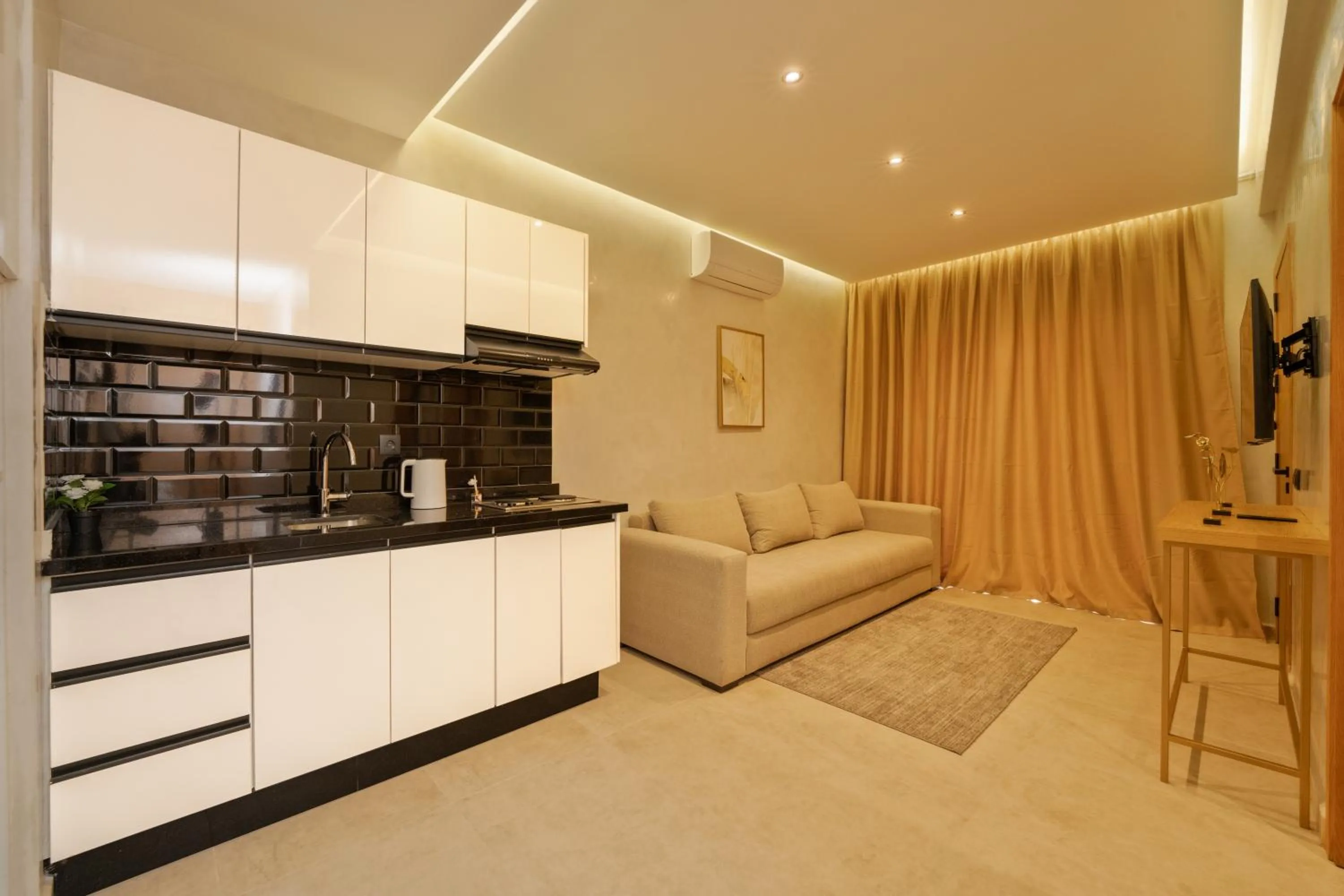 Kitchen or kitchenette in Appart Hôtel Rambla