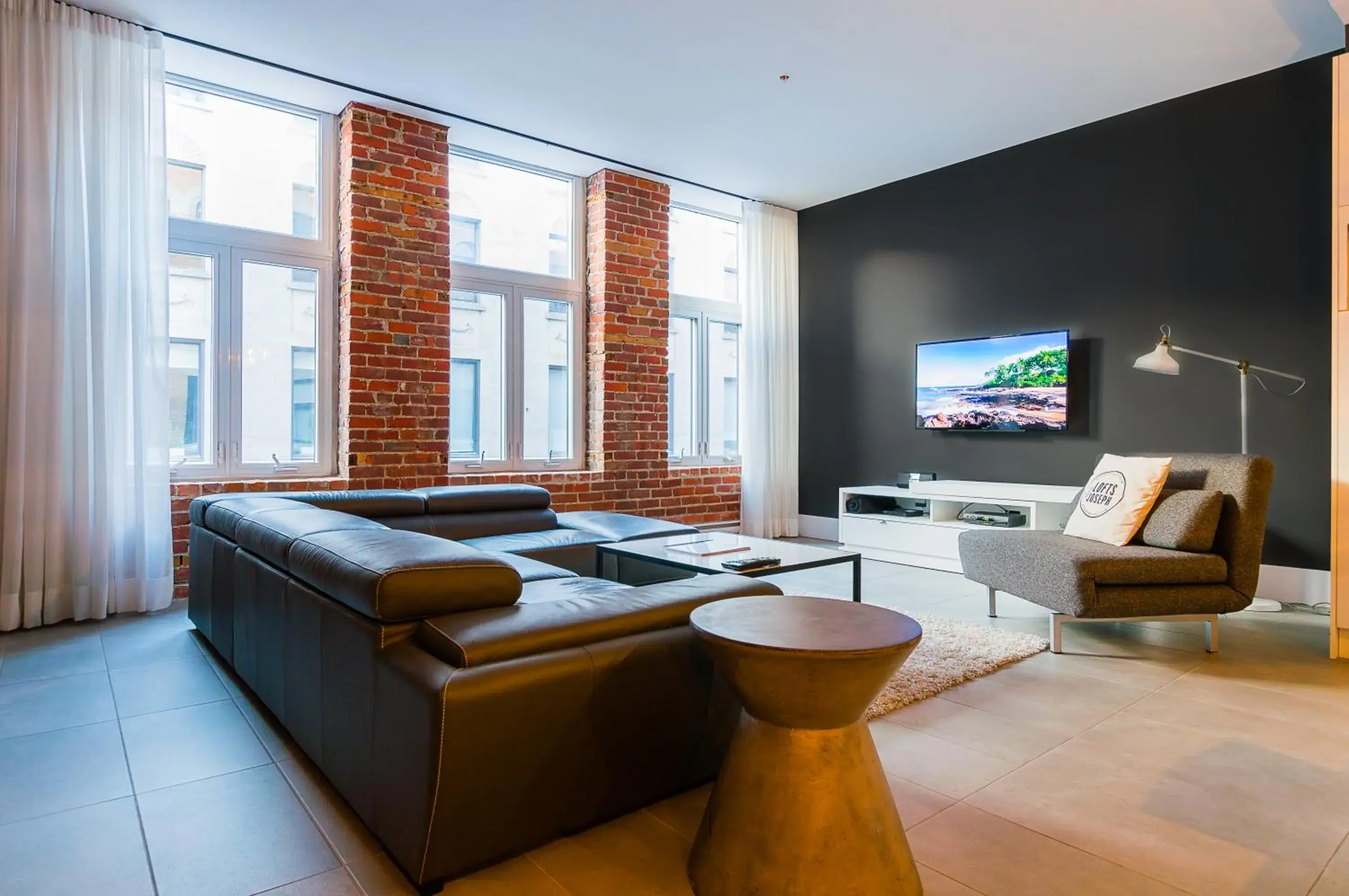 Two-Bedroom Loft 102 in Les Lofts St-Joseph - Par Les Lofts Vieux-Québec Two-Bedroom Loft 102 in Les Lofts St-Joseph - Par Les Lofts Vieux-Québec