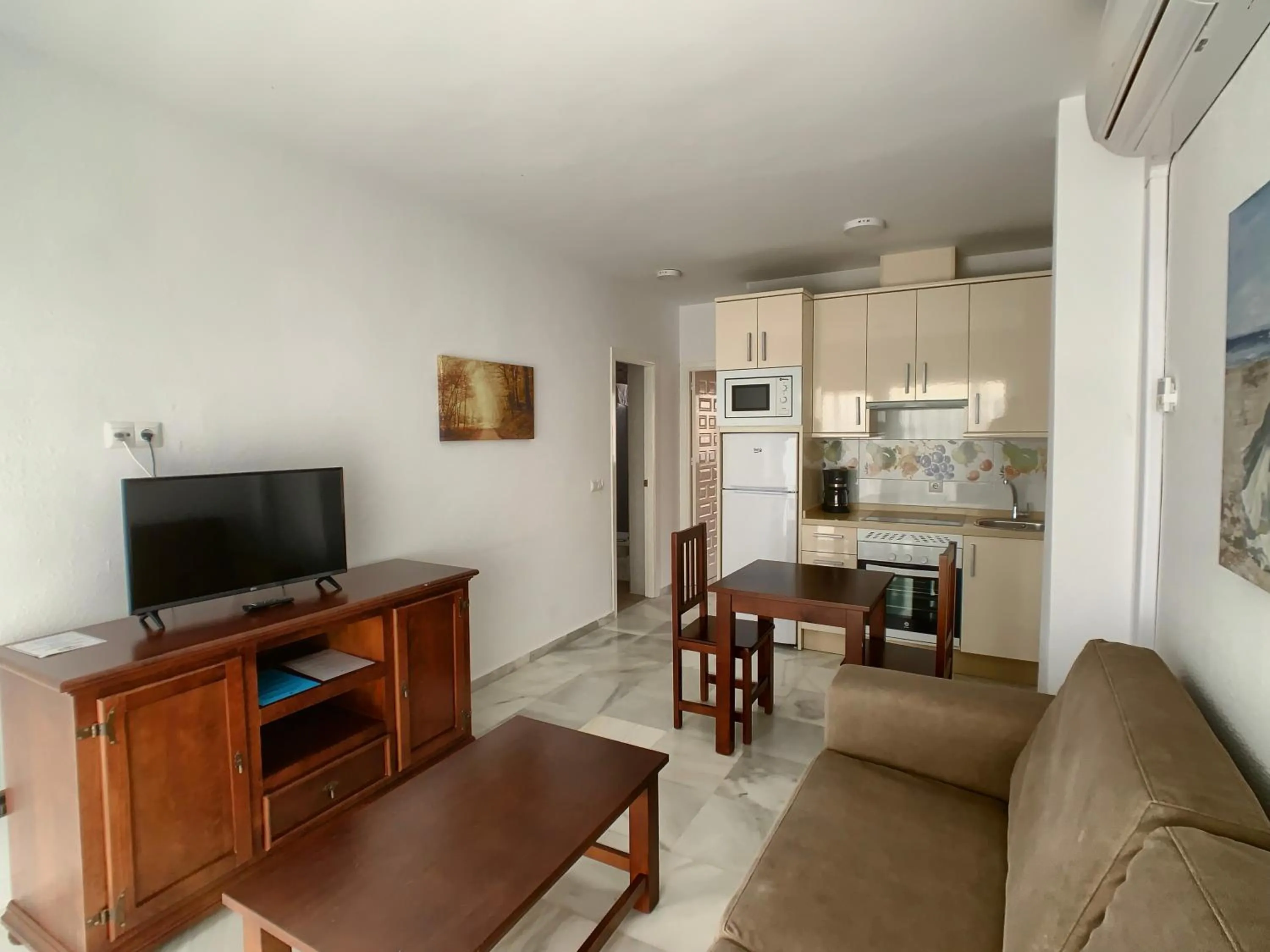 Kitchen or kitchenette in Apartamentos Perla Marina