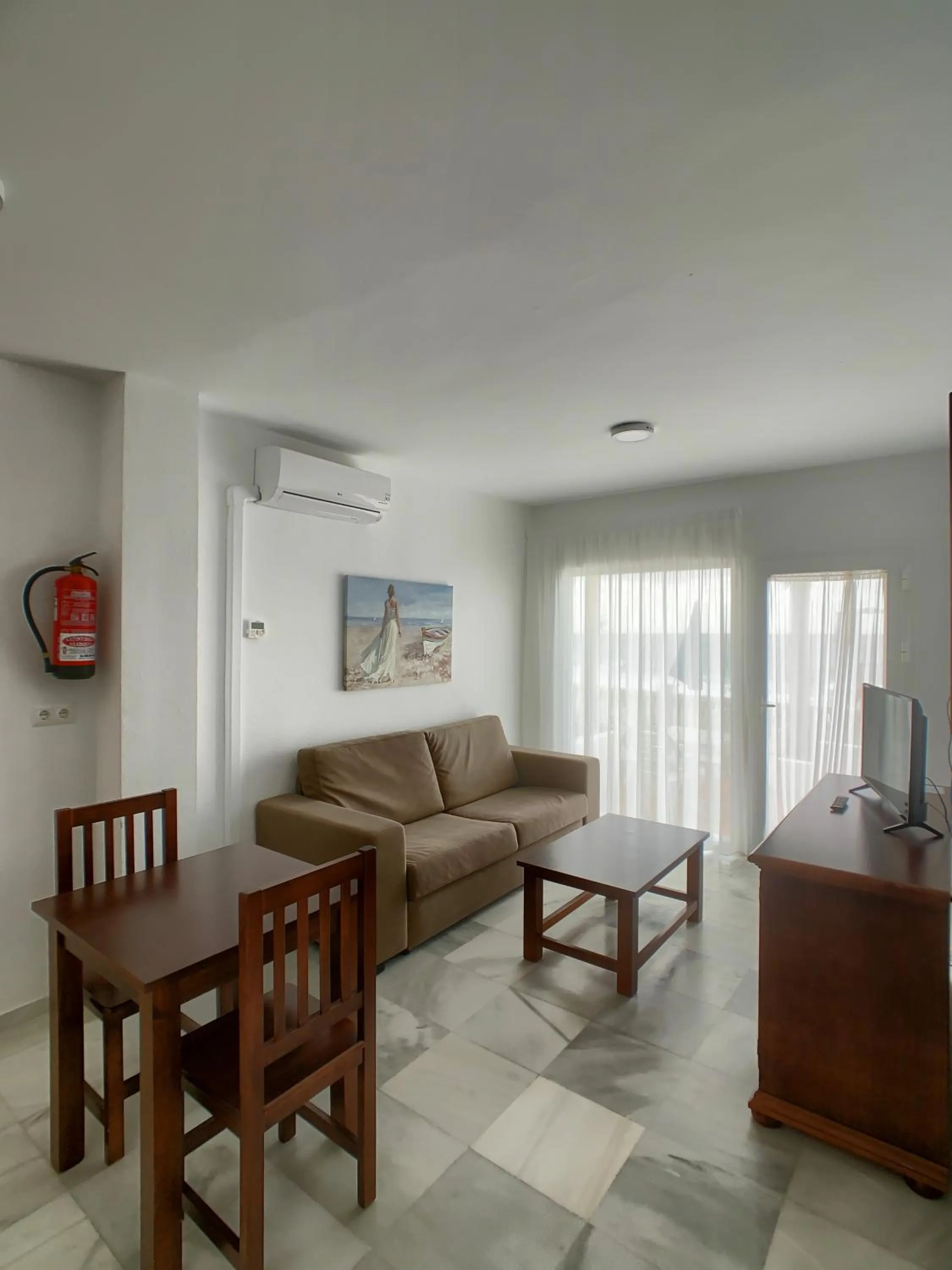 Living room in Apartamentos Perla Marina