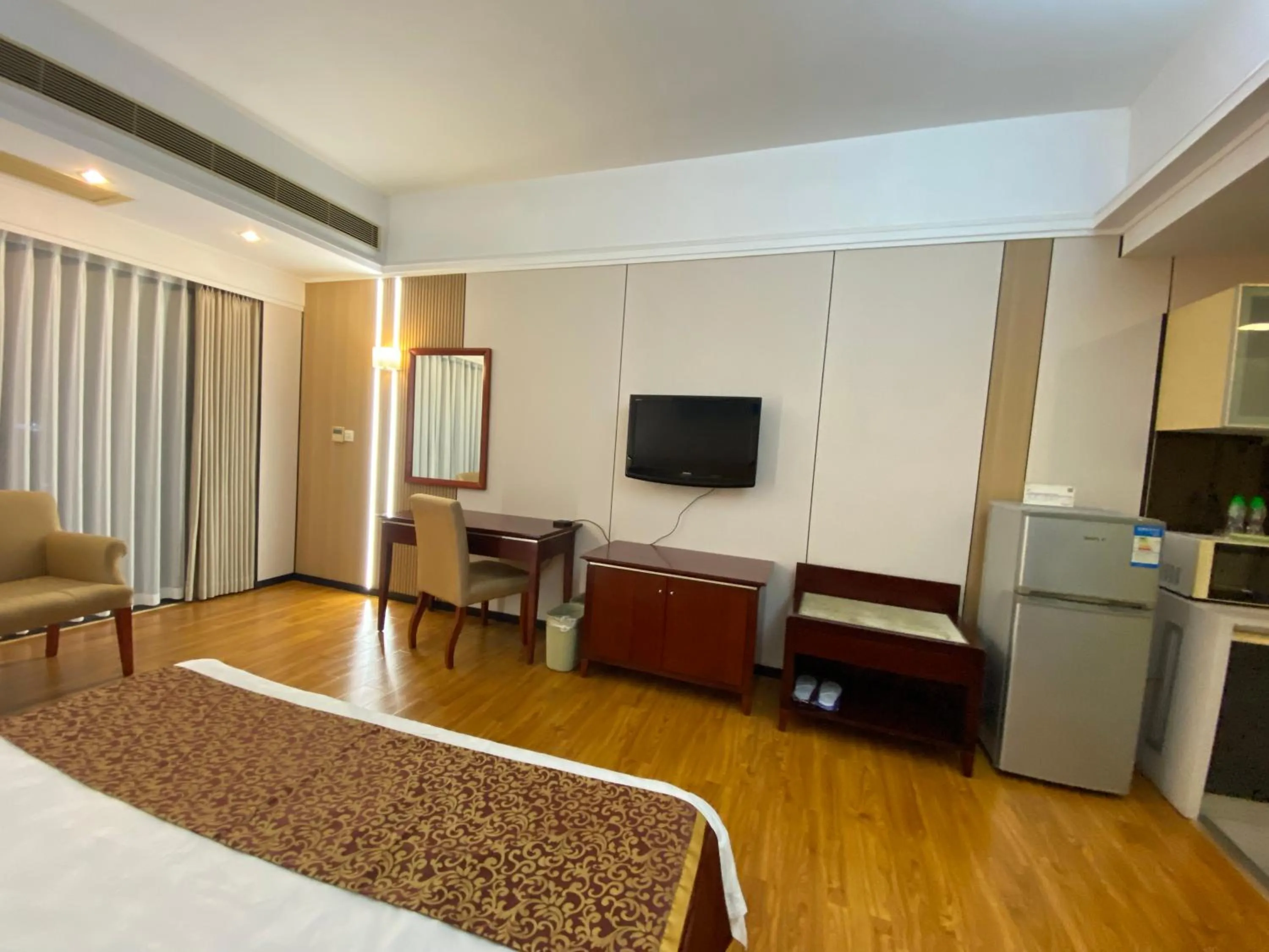 bunk bed, TV/Entertainment Center in 悦丰酒店广州银丰国际公寓北站店