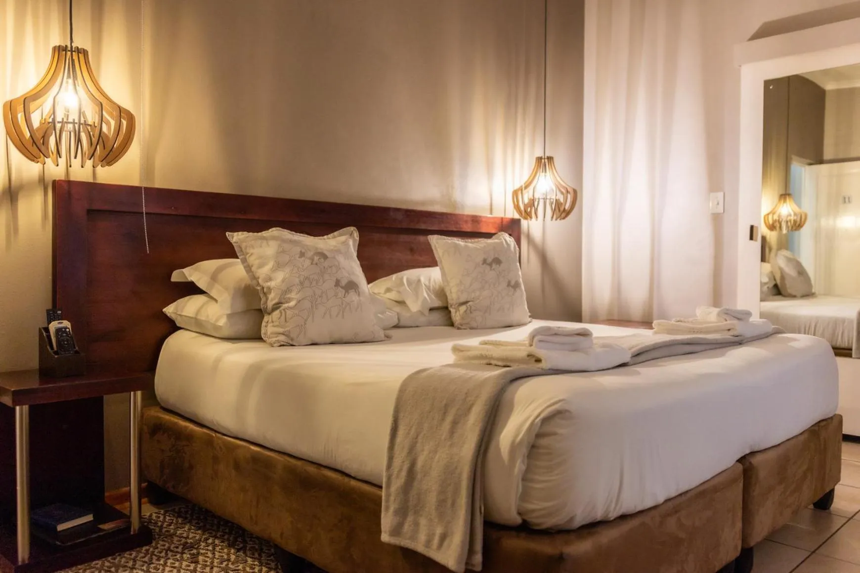 Bedroom, Bed in Elegant Lodge & Conference Center