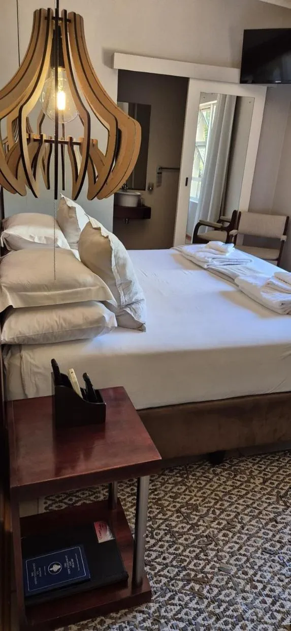 Bedroom, Bed in Elegant Lodge & Conference Center