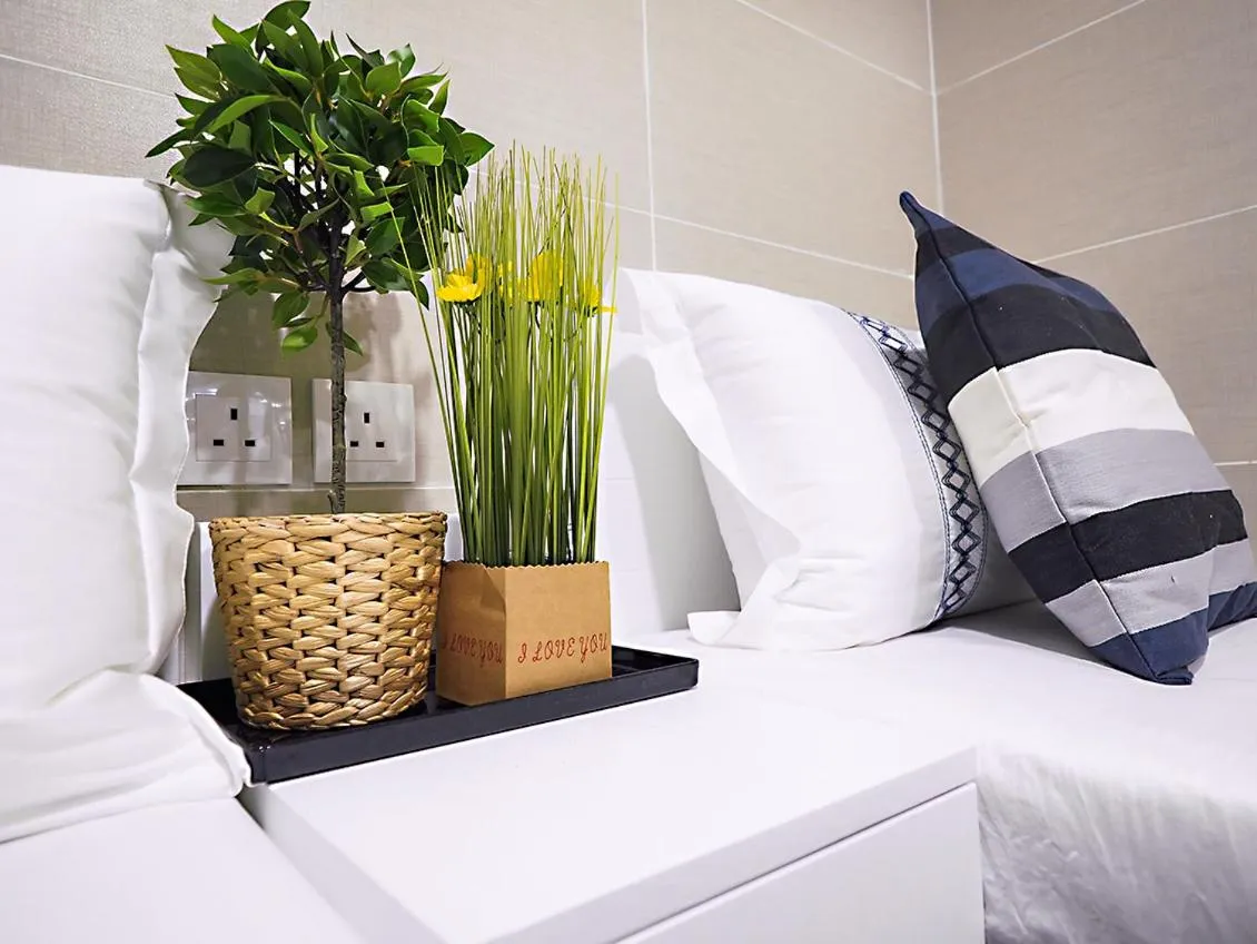 Bed in Joyous Guest House