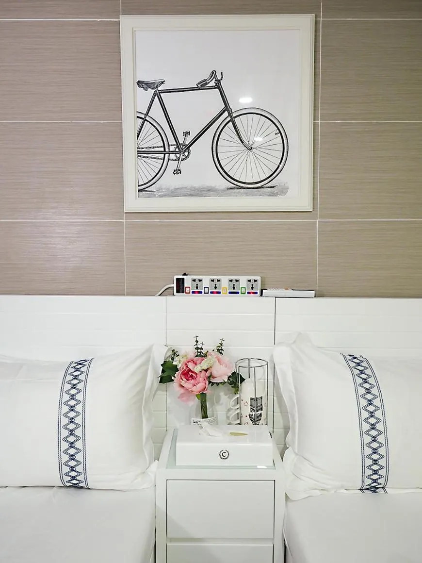 Bed in Joyous Guest House