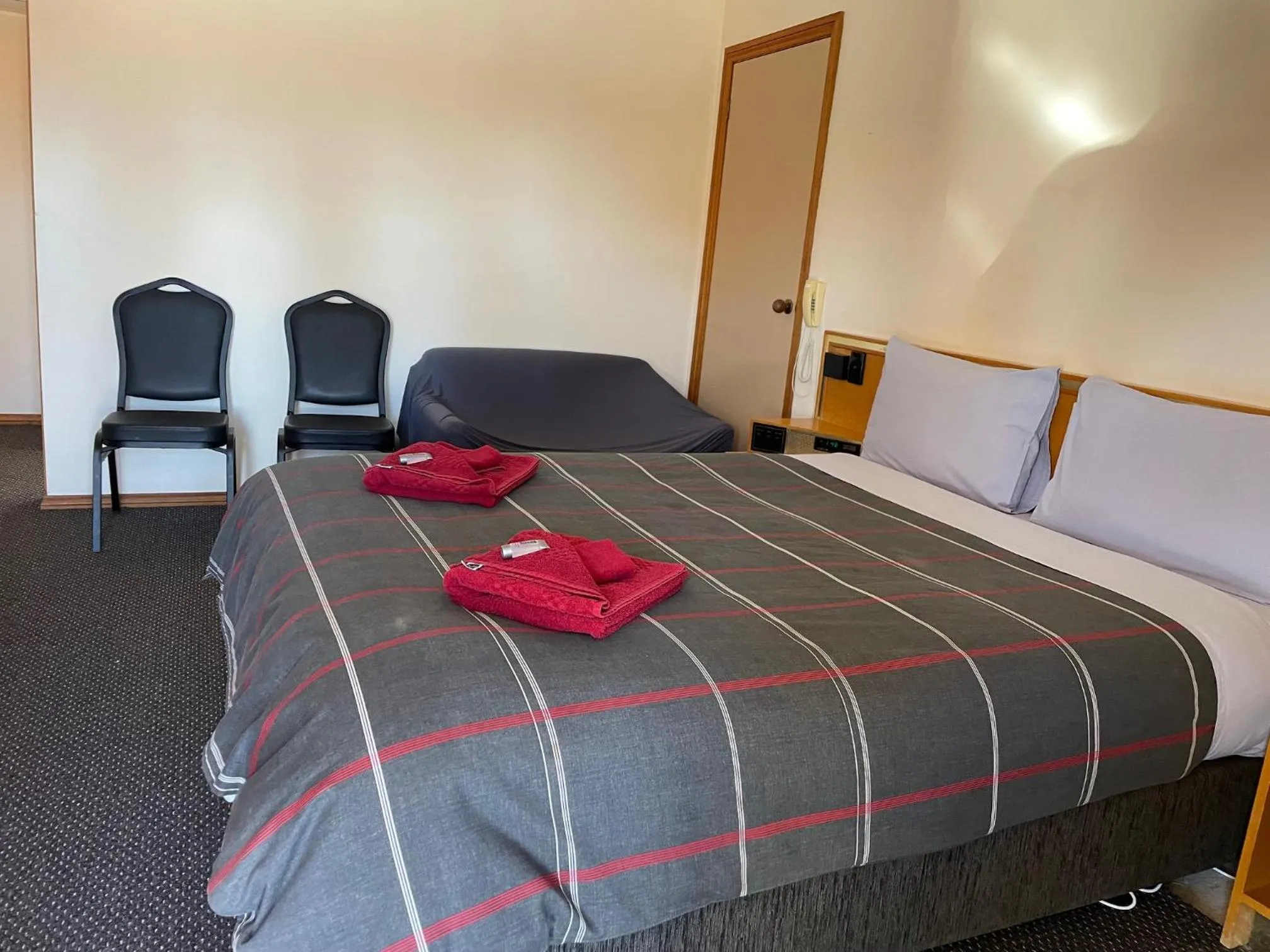 Bed in True blue Motor Inn