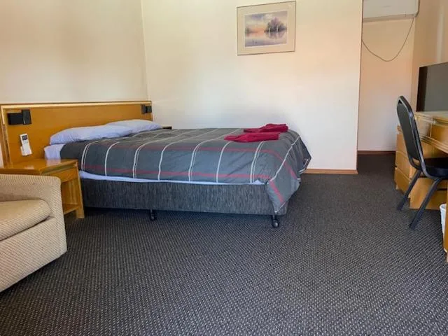 Bed in True blue Motor Inn