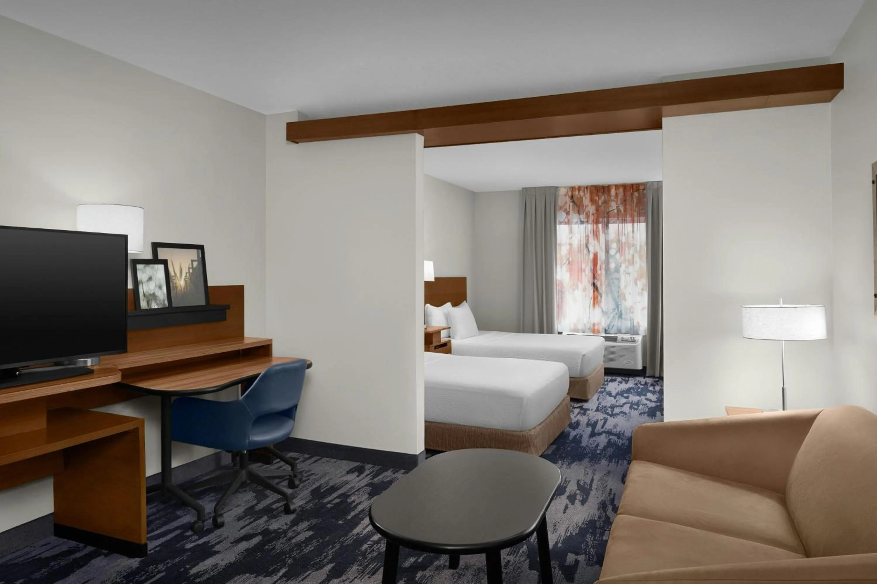Living room, Bed in Fairfield Inn & Suites by Marriott Fayetteville North