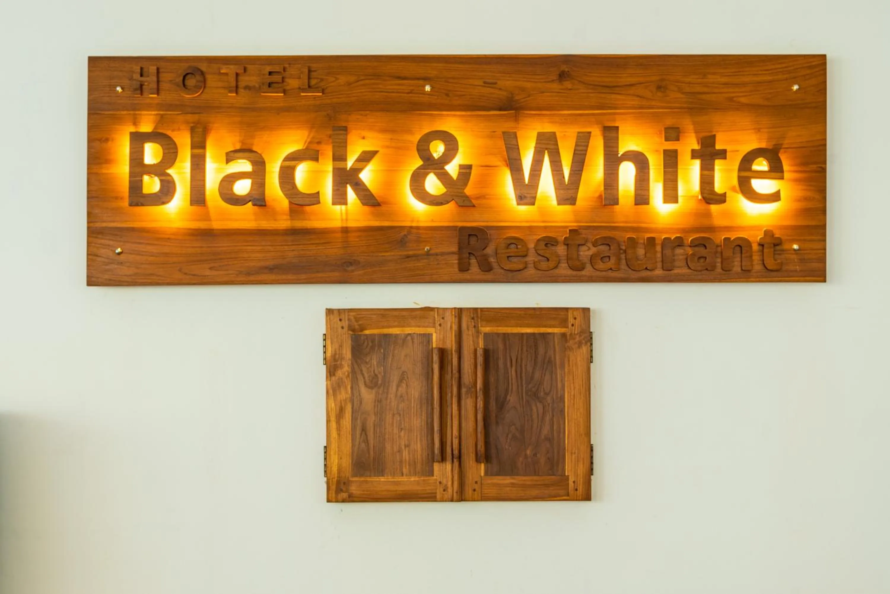 Property logo or sign in Eco Hotel Black & White - Anuradhapura