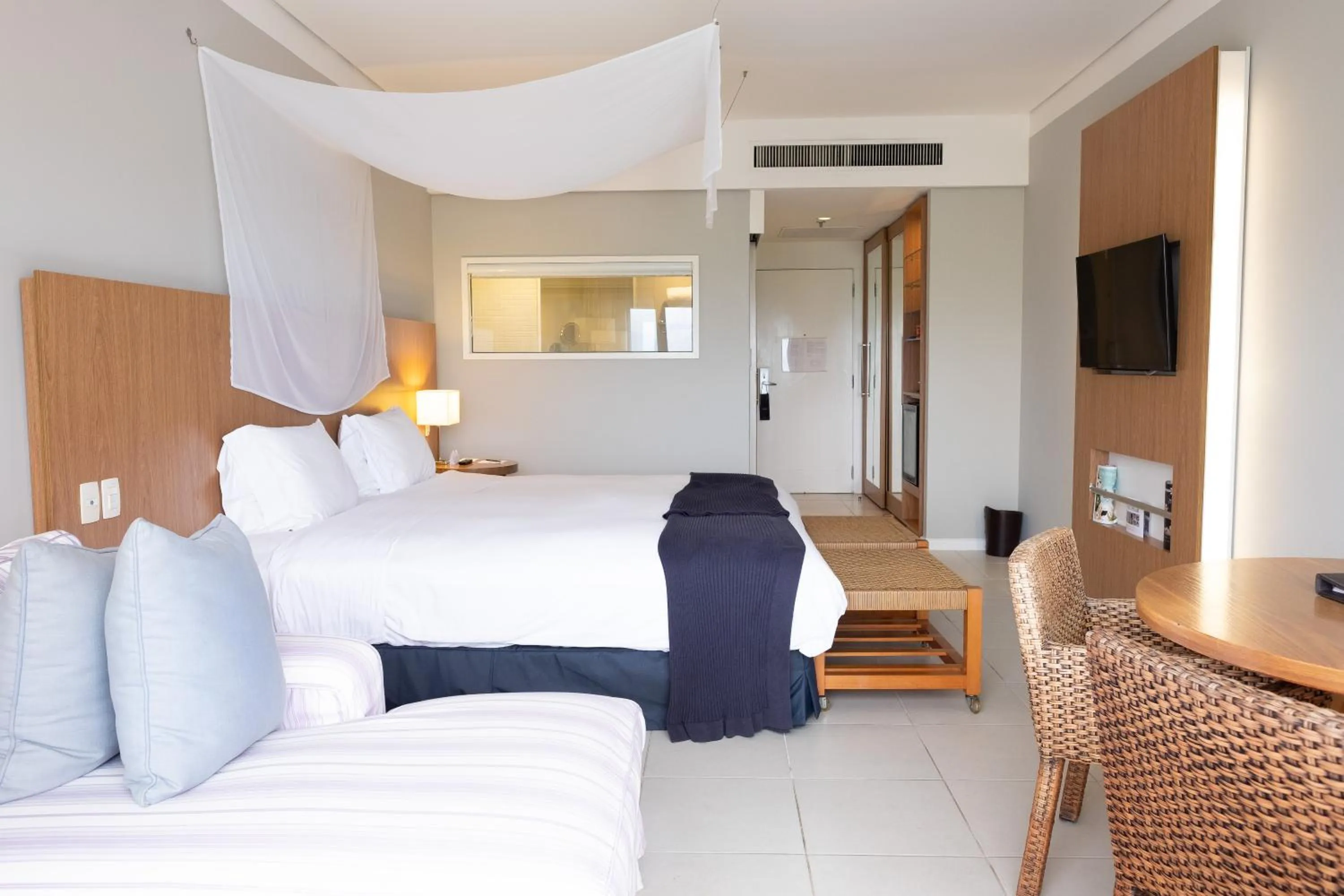 Photo of the whole room, Bed in Hotel Jequitimar Guaruja Resort & Spa by Accor - Ex Sofitel