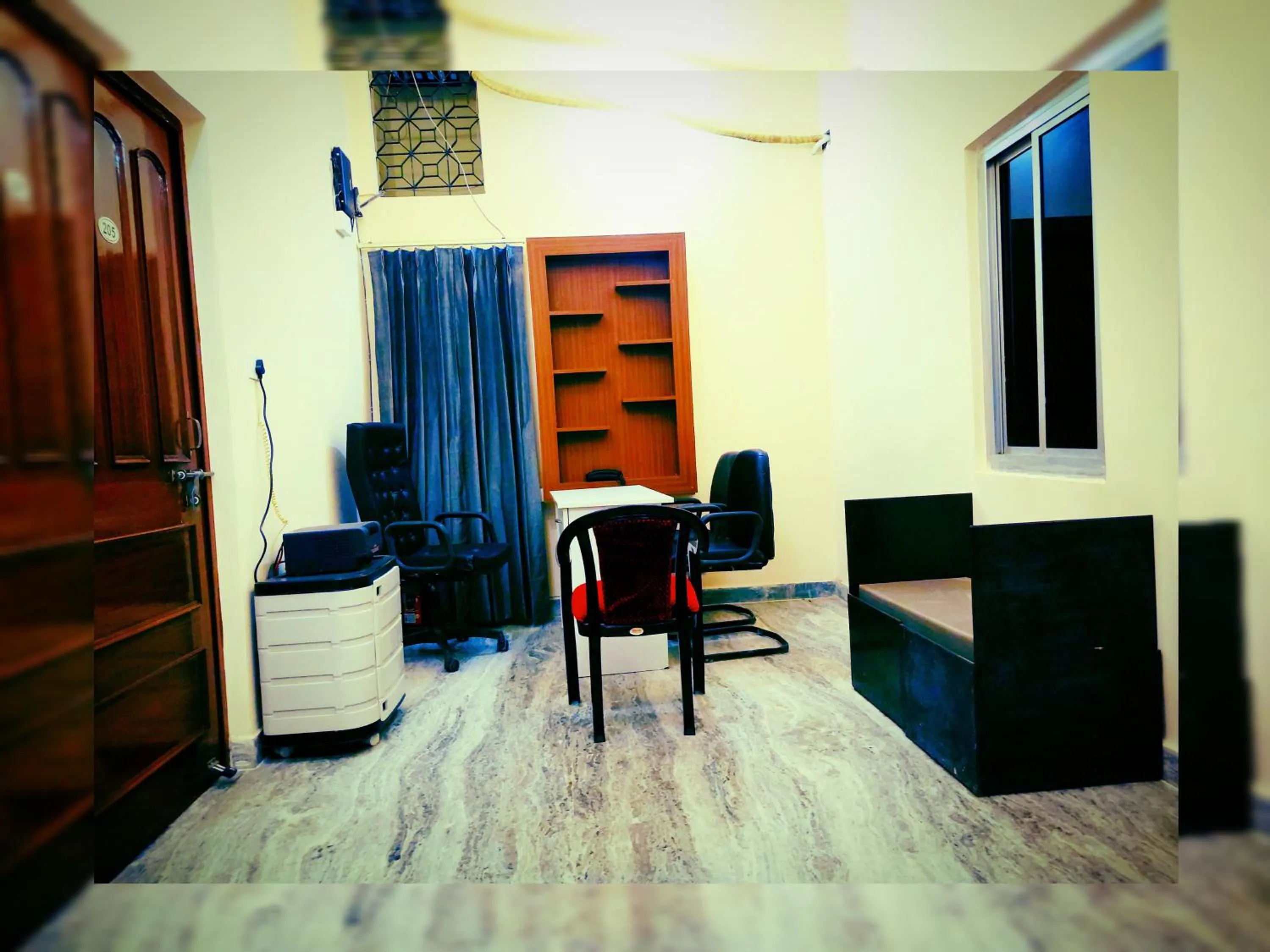 Seating area in Kashyaam Inn