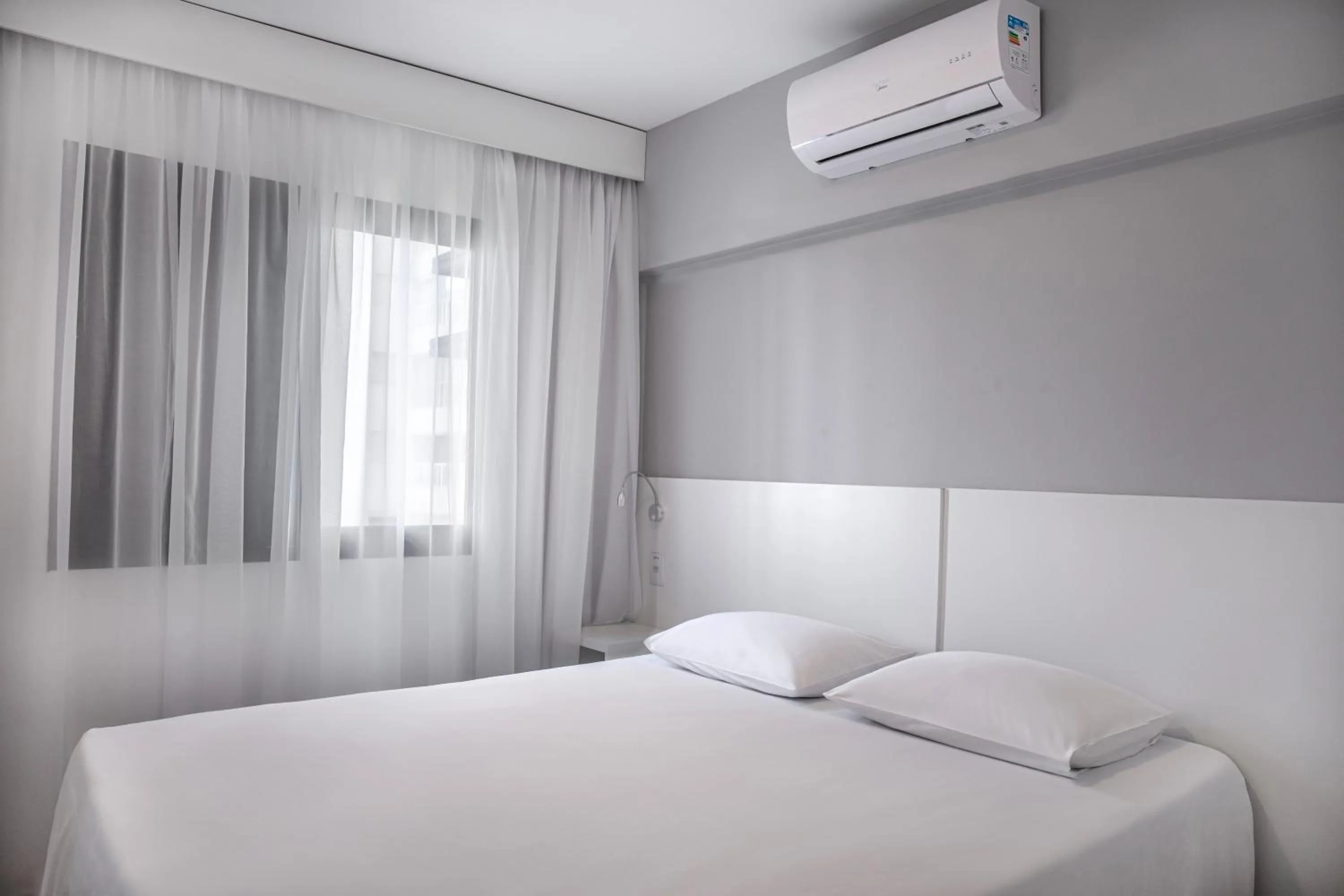 Bed in Mercure Sao Paulo Berrini