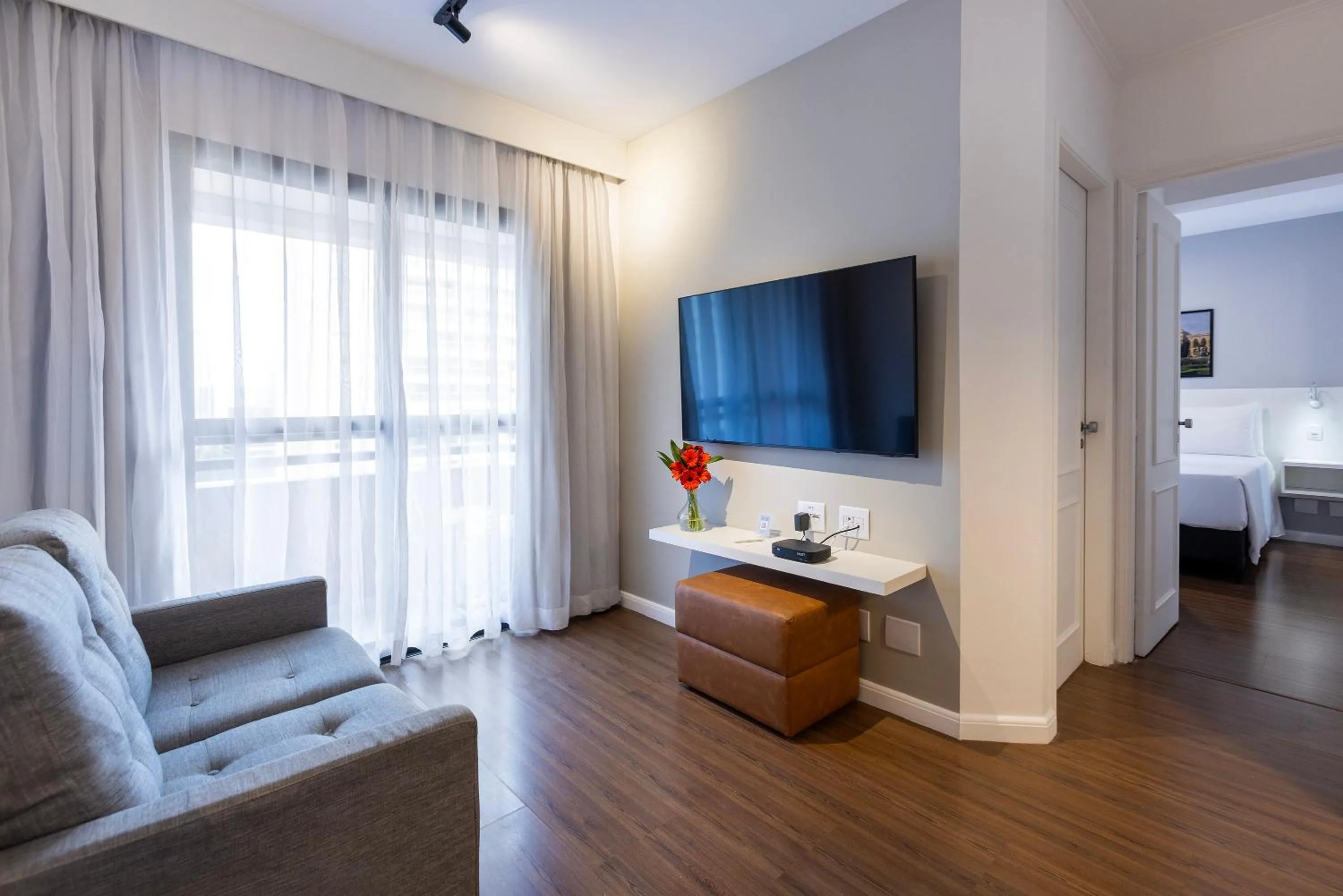 Living room, Bed in Mercure Sao Paulo Berrini