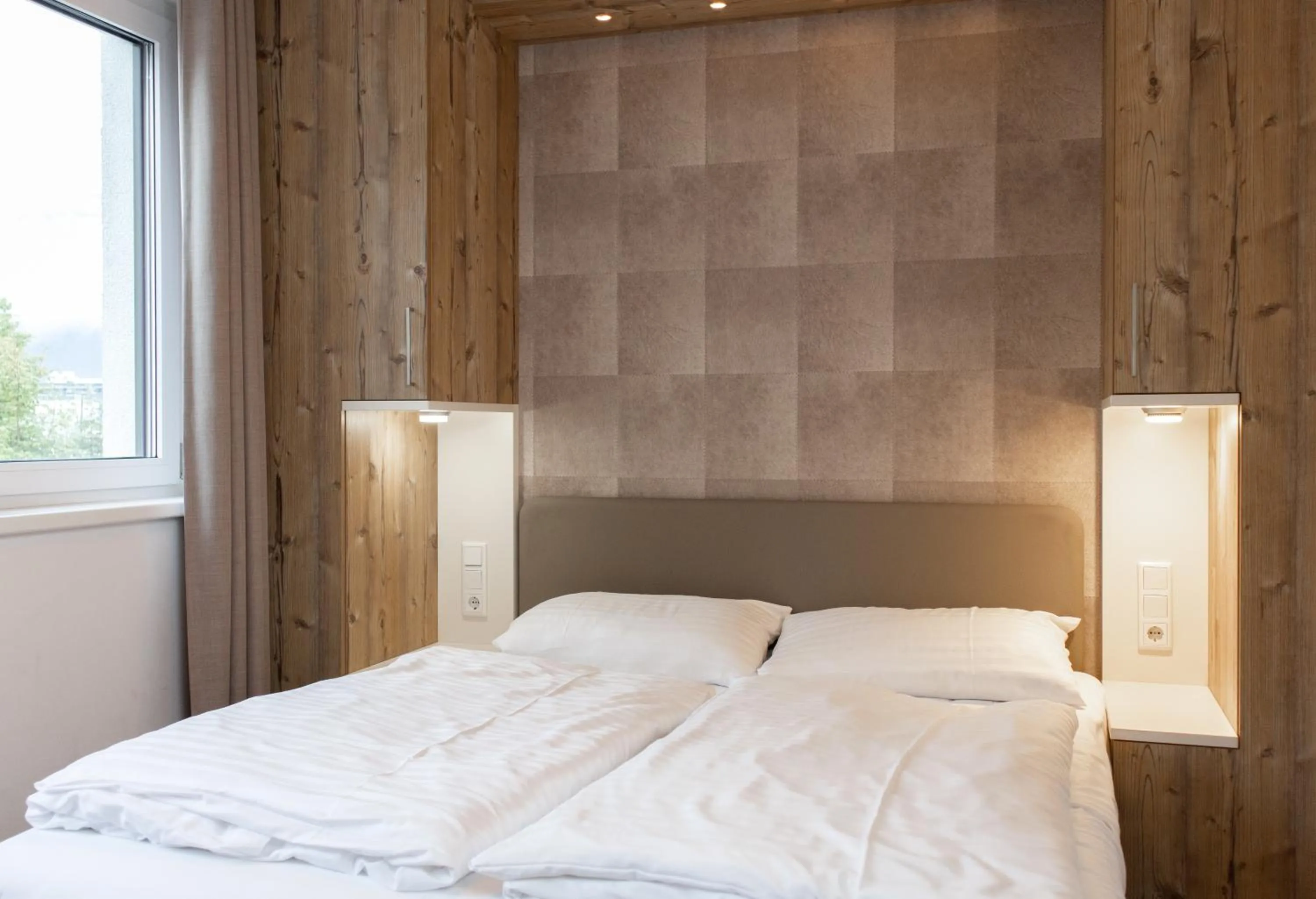 Bed in Ski & Golf Suites Zell am See by Alpin Rentals