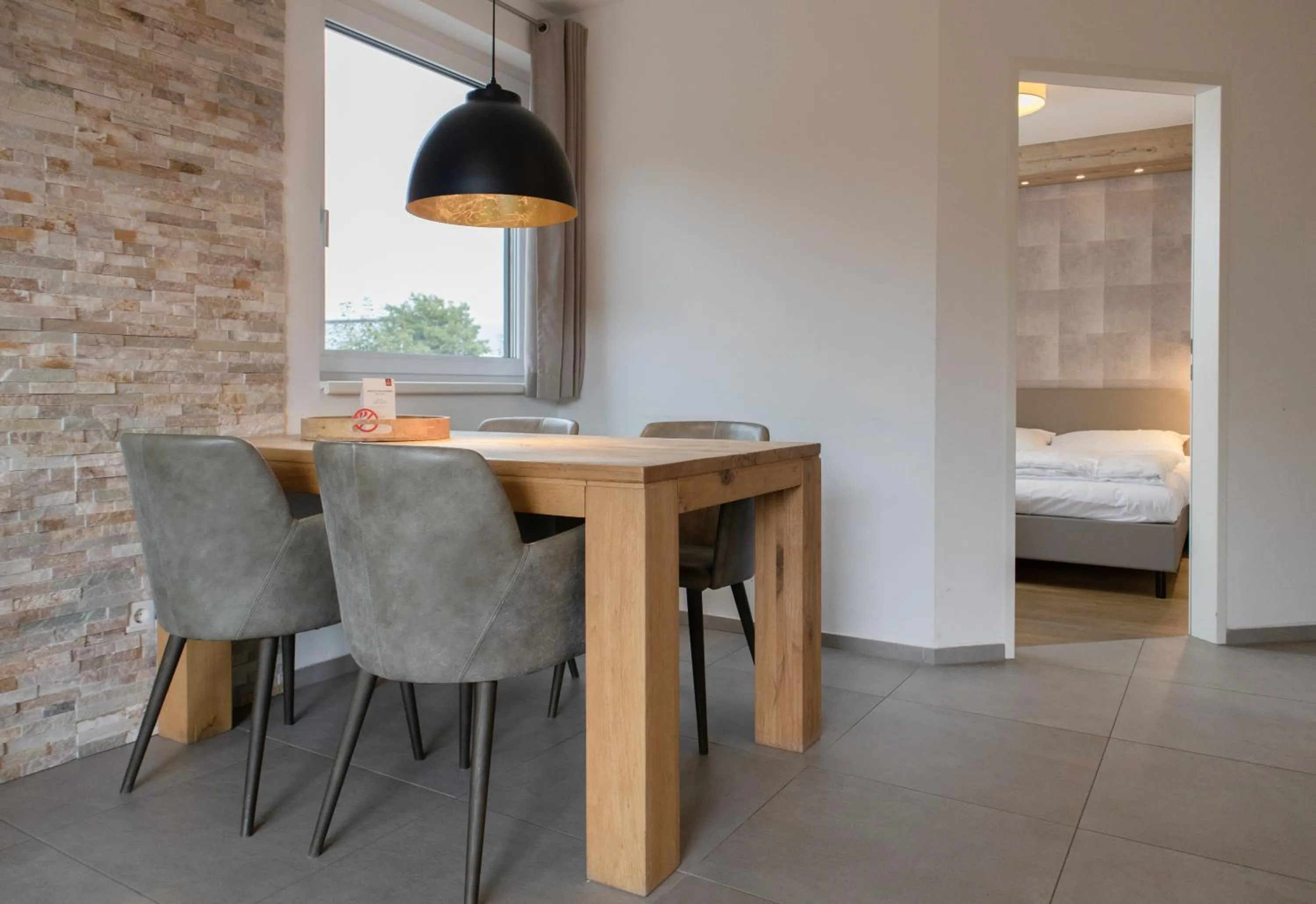 Seating area, Bed in Ski & Golf Suites Zell am See by Alpin Rentals