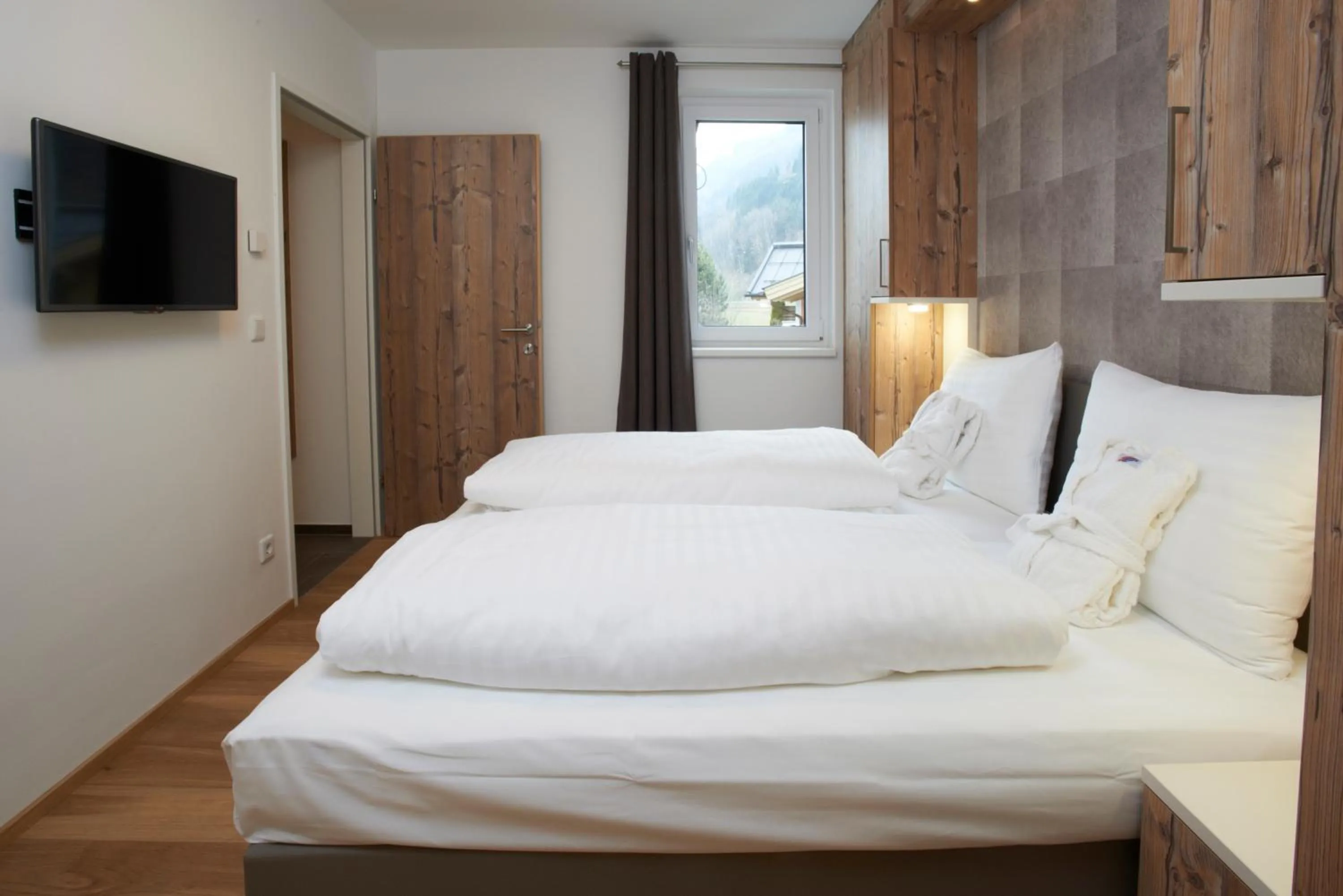 Bedroom, Bed in Ski & Golf Suites Zell am See by Alpin Rentals