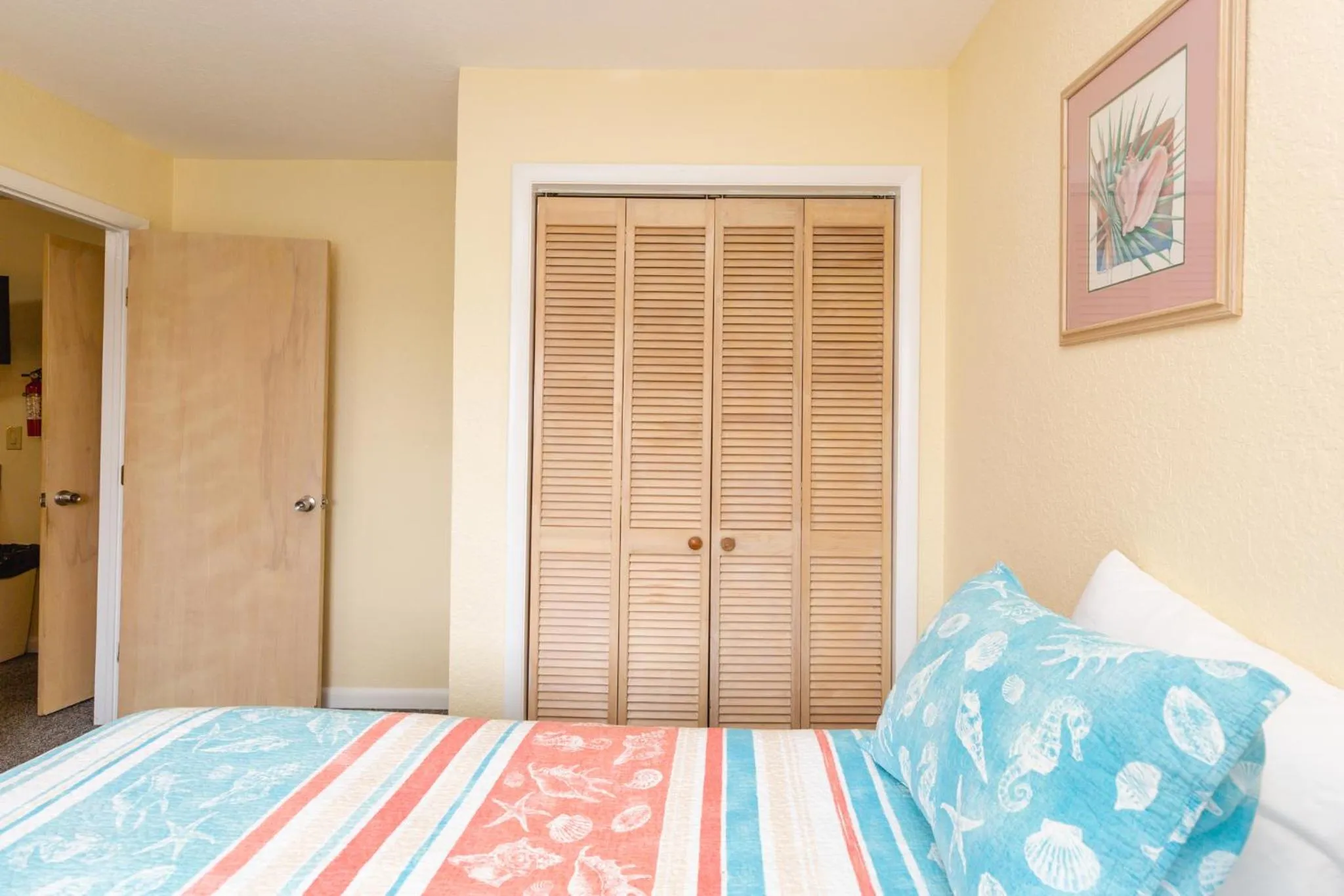 Bed in Sea Scape Beach and Golf Villas