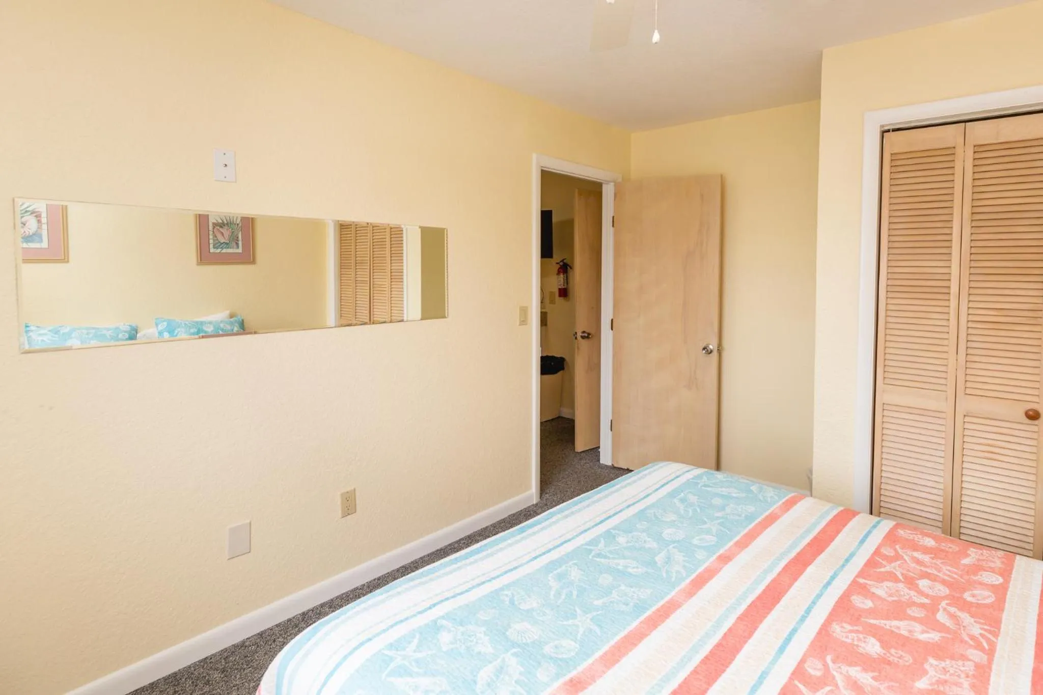 Bed in Sea Scape Beach and Golf Villas