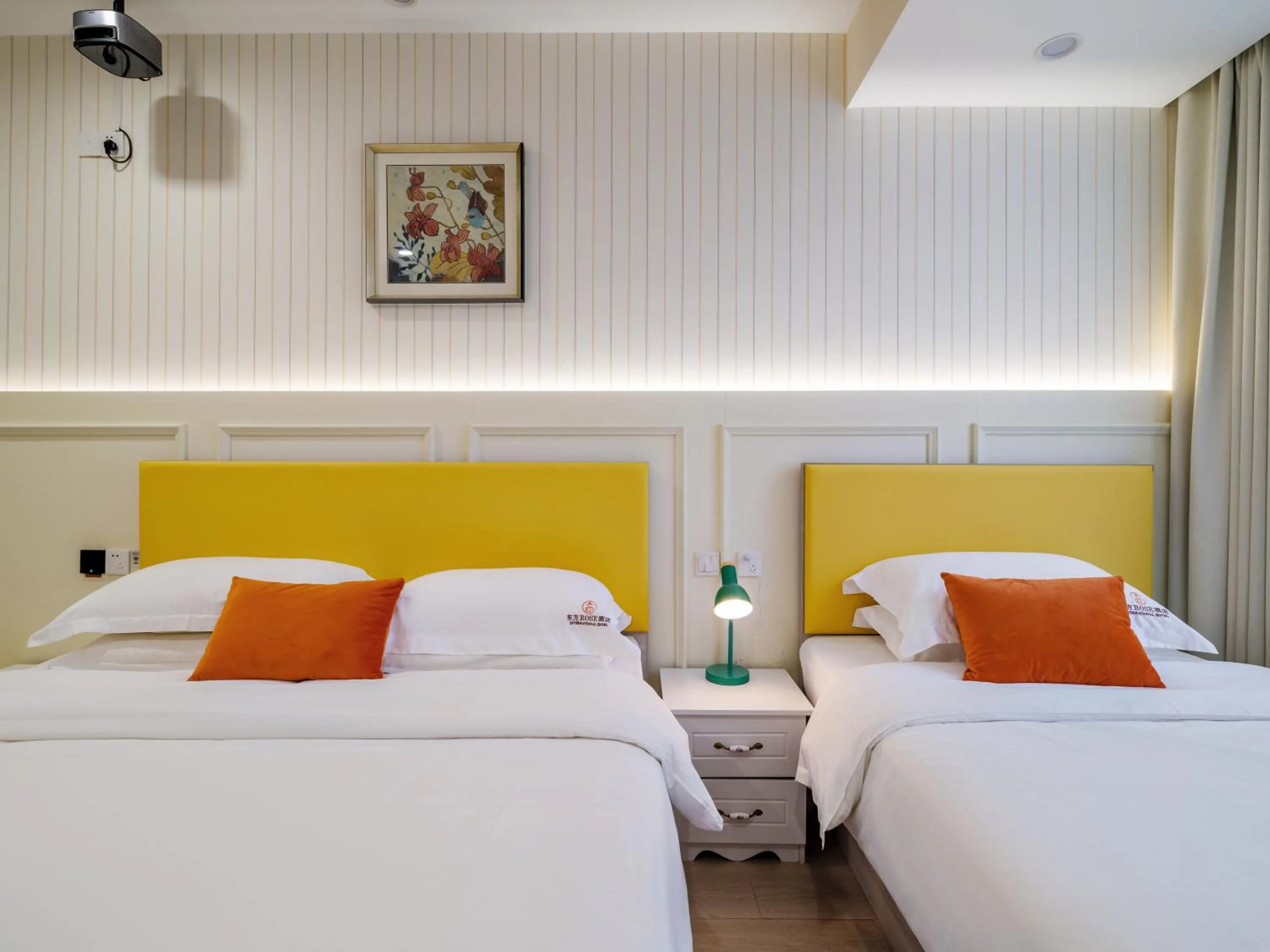 Bed in Orient Rose International Hotel