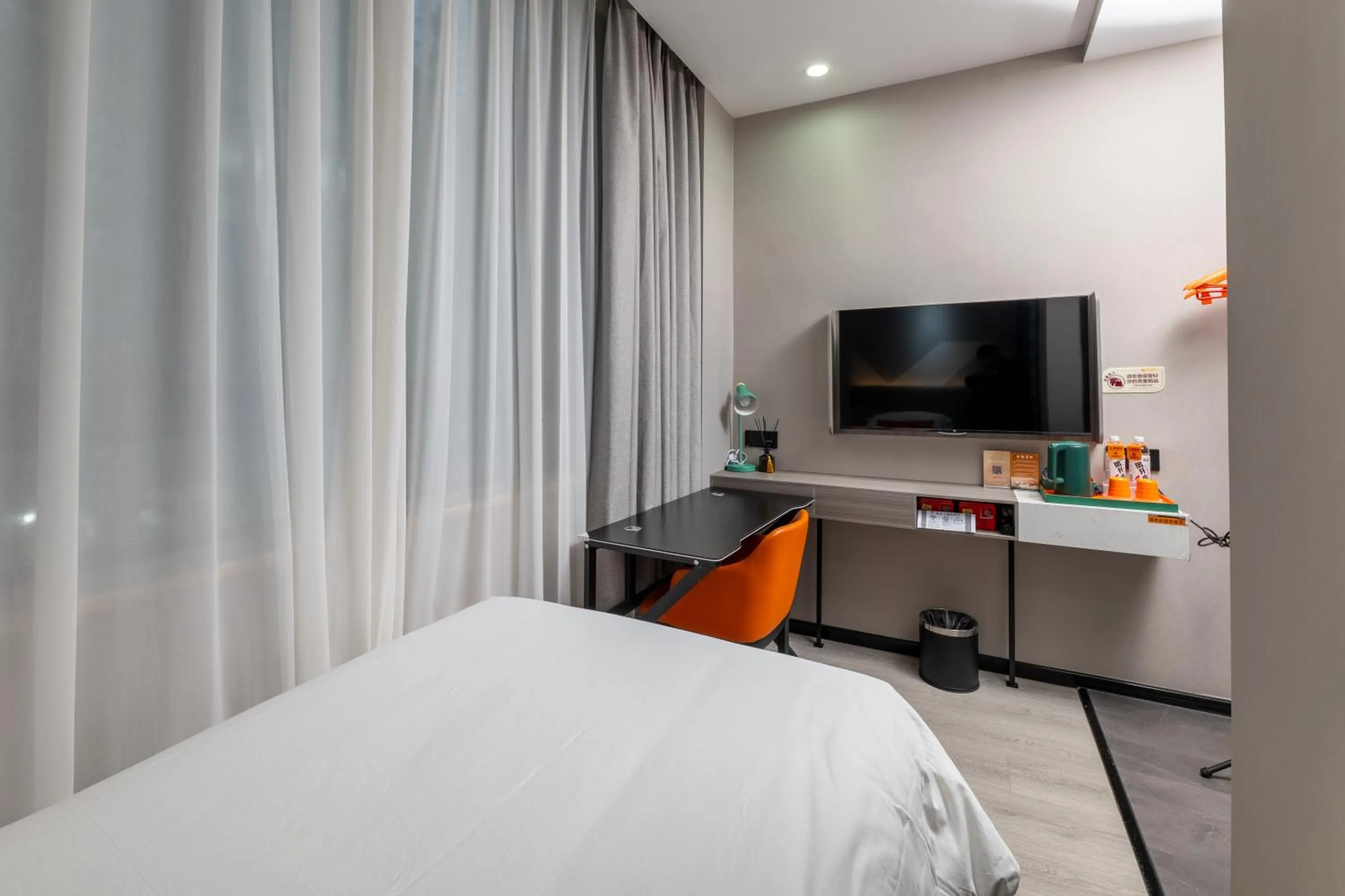 Bed in Orient Rose International Hotel