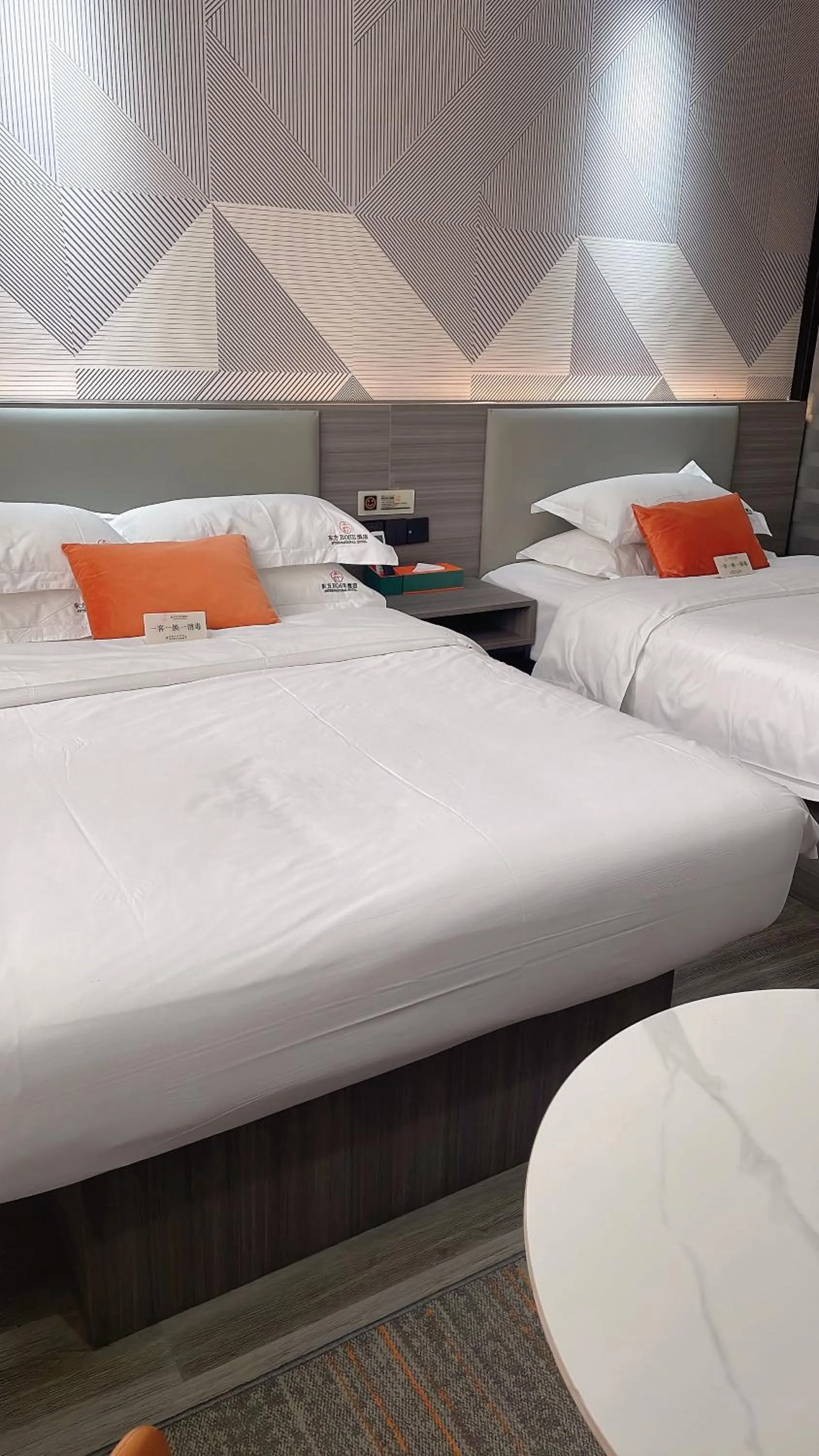 Bed in Orient Rose International Hotel