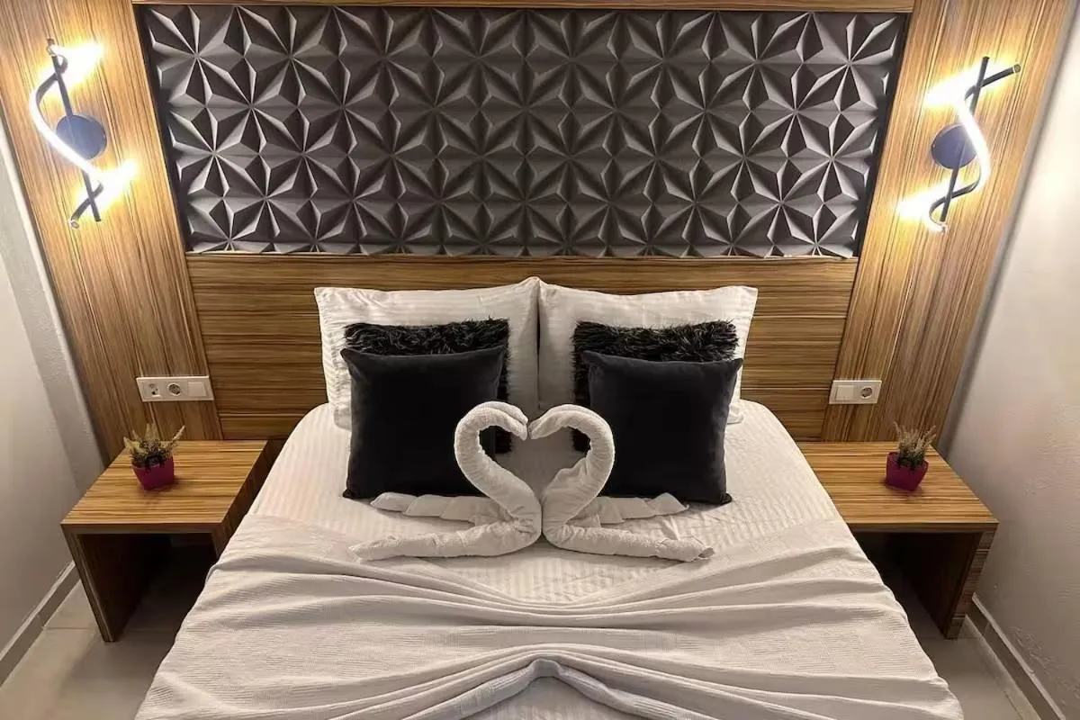 Bed in Royal Ezel Hotel