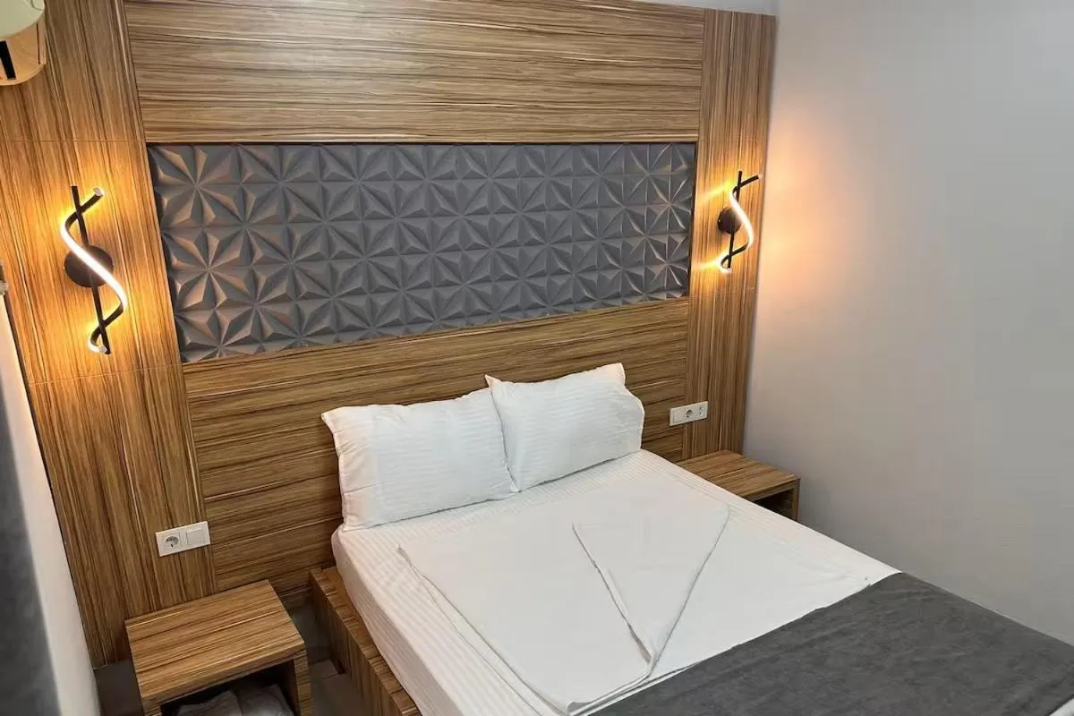 Bed in Royal Ezel Hotel