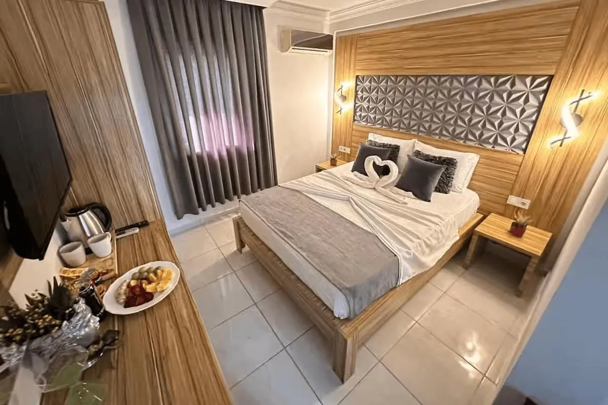 Bed in Royal Ezel Hotel