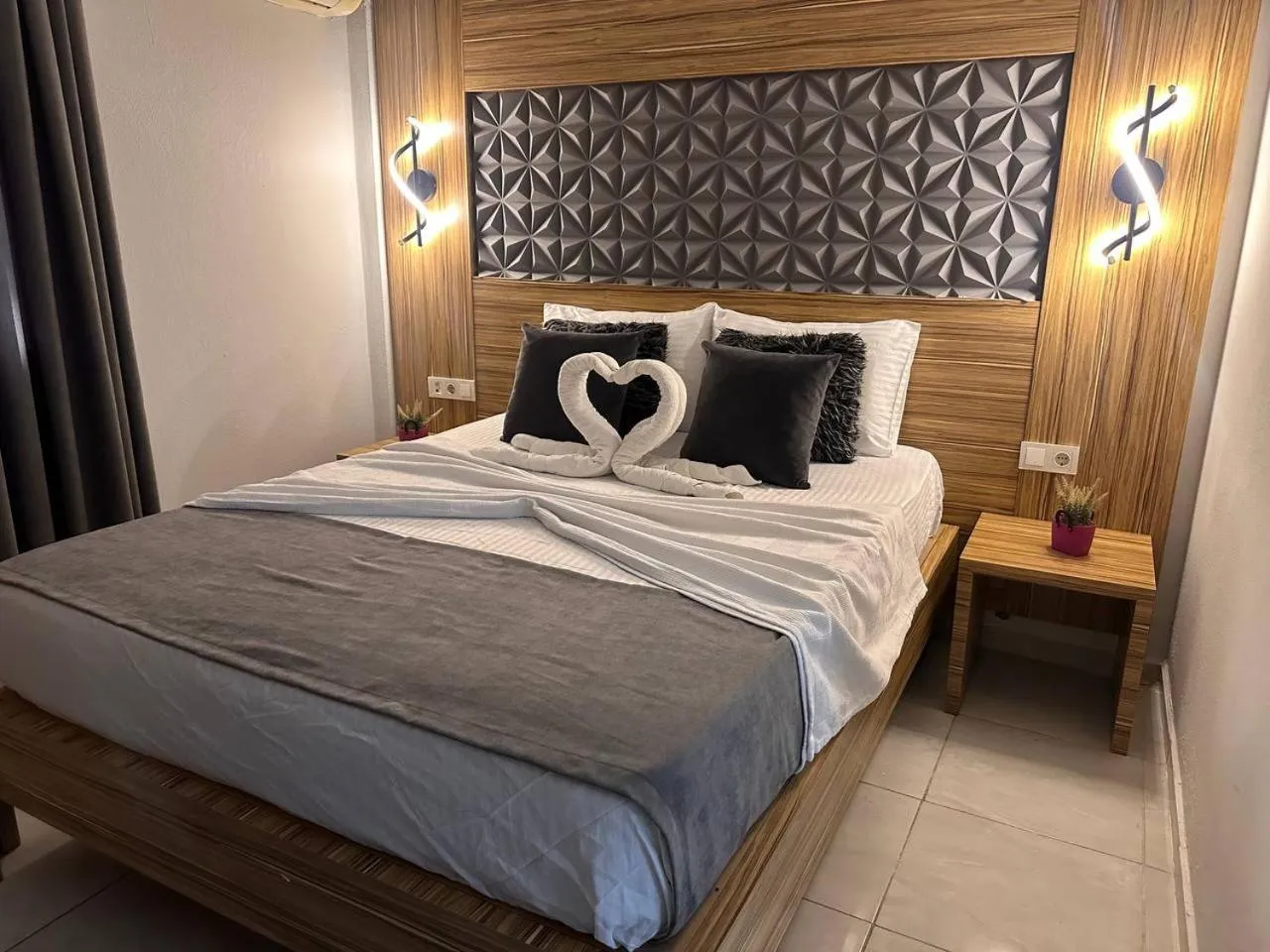 Bed in Royal Ezel Hotel