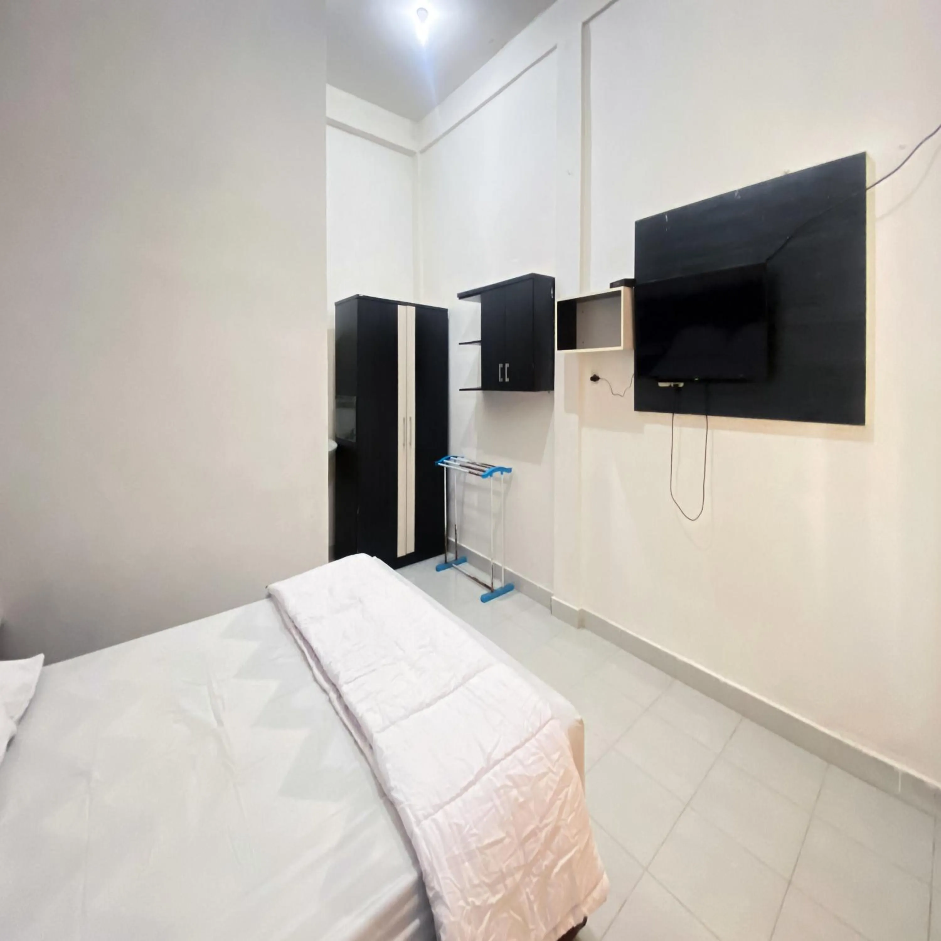 Bedroom, Bed in Wisma Al-Araf Syariah Mitra RedDoorz Palembang
