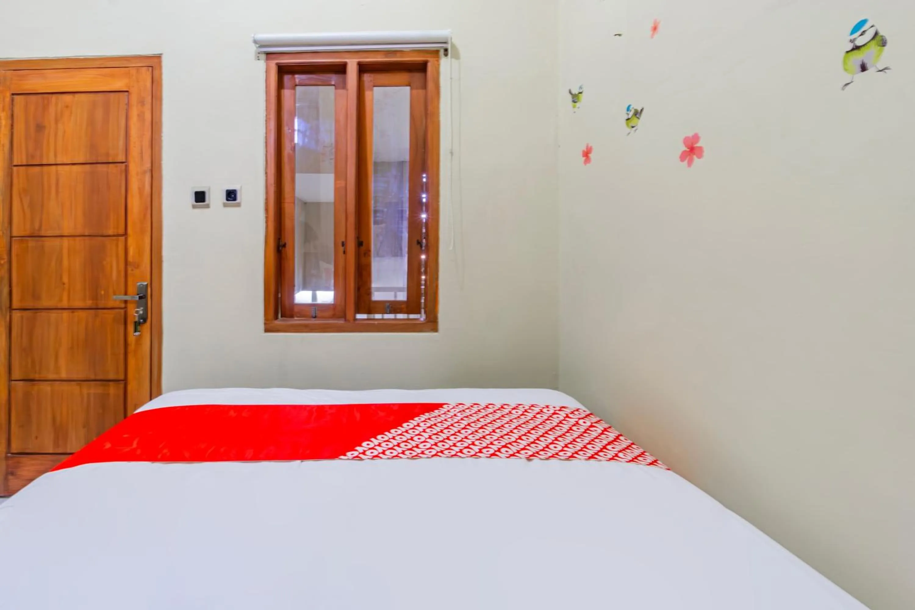 Bedroom in Hotel O Ipeda Family Residence