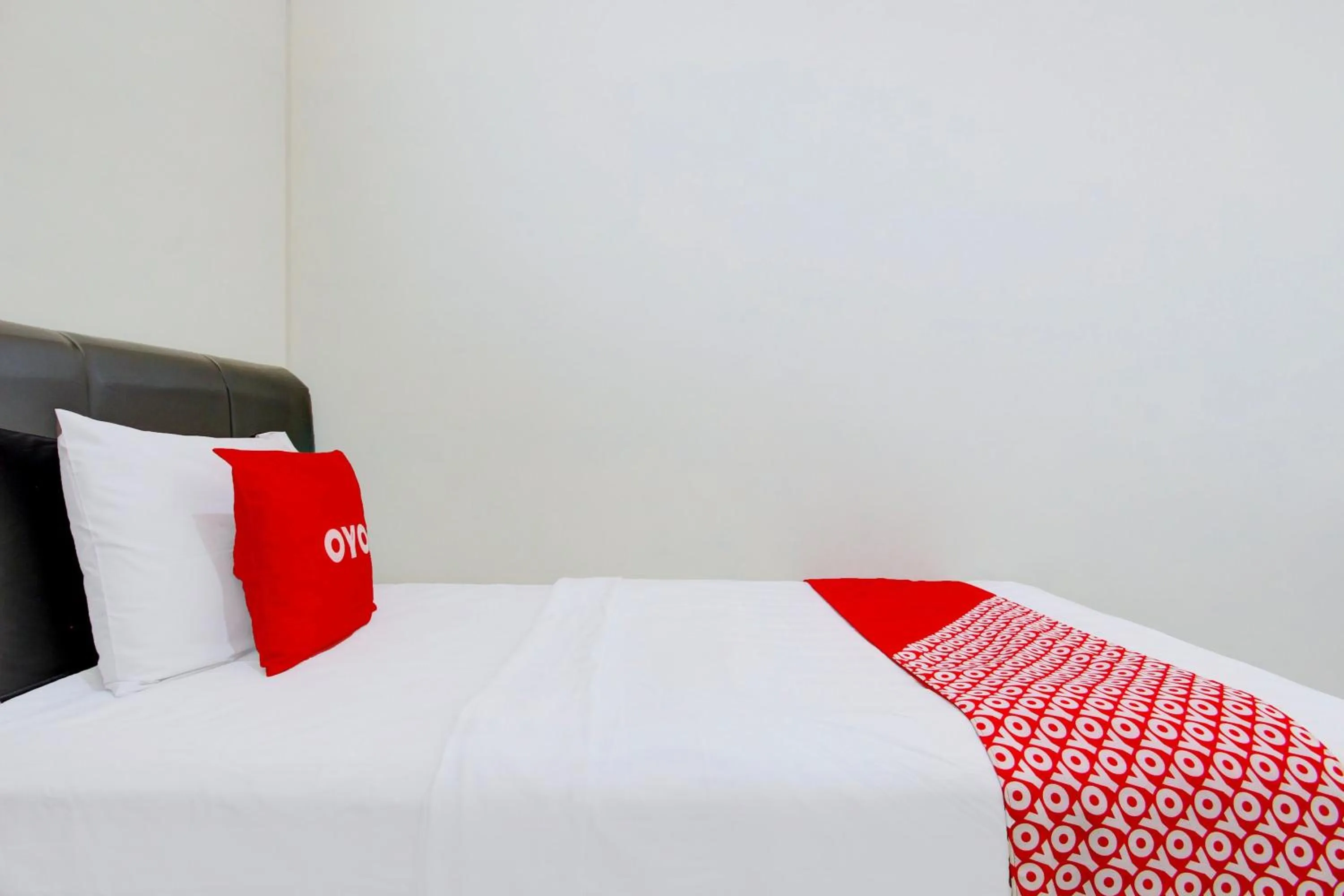 Bedroom, Bed in Hotel O Delia Inn Syariah