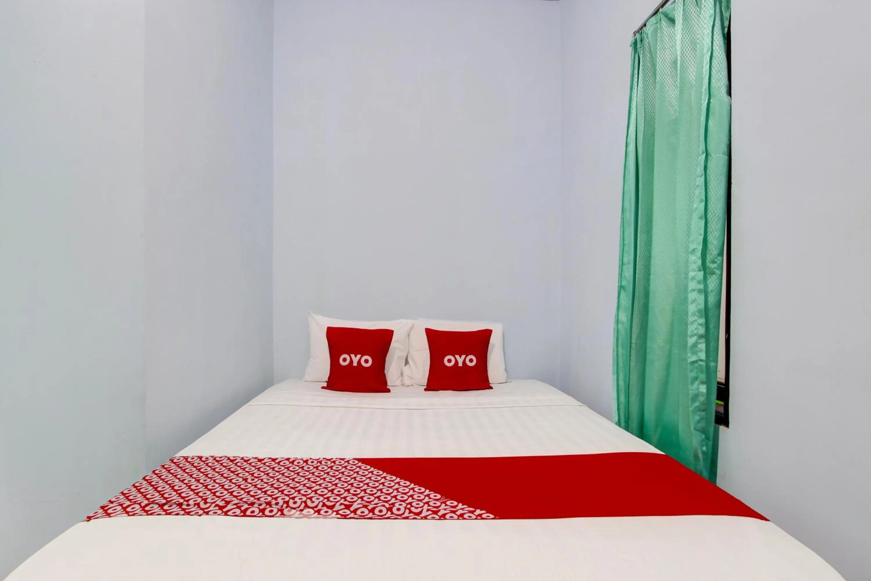 Bedroom in Hotel O Minso Inn Sepanjang