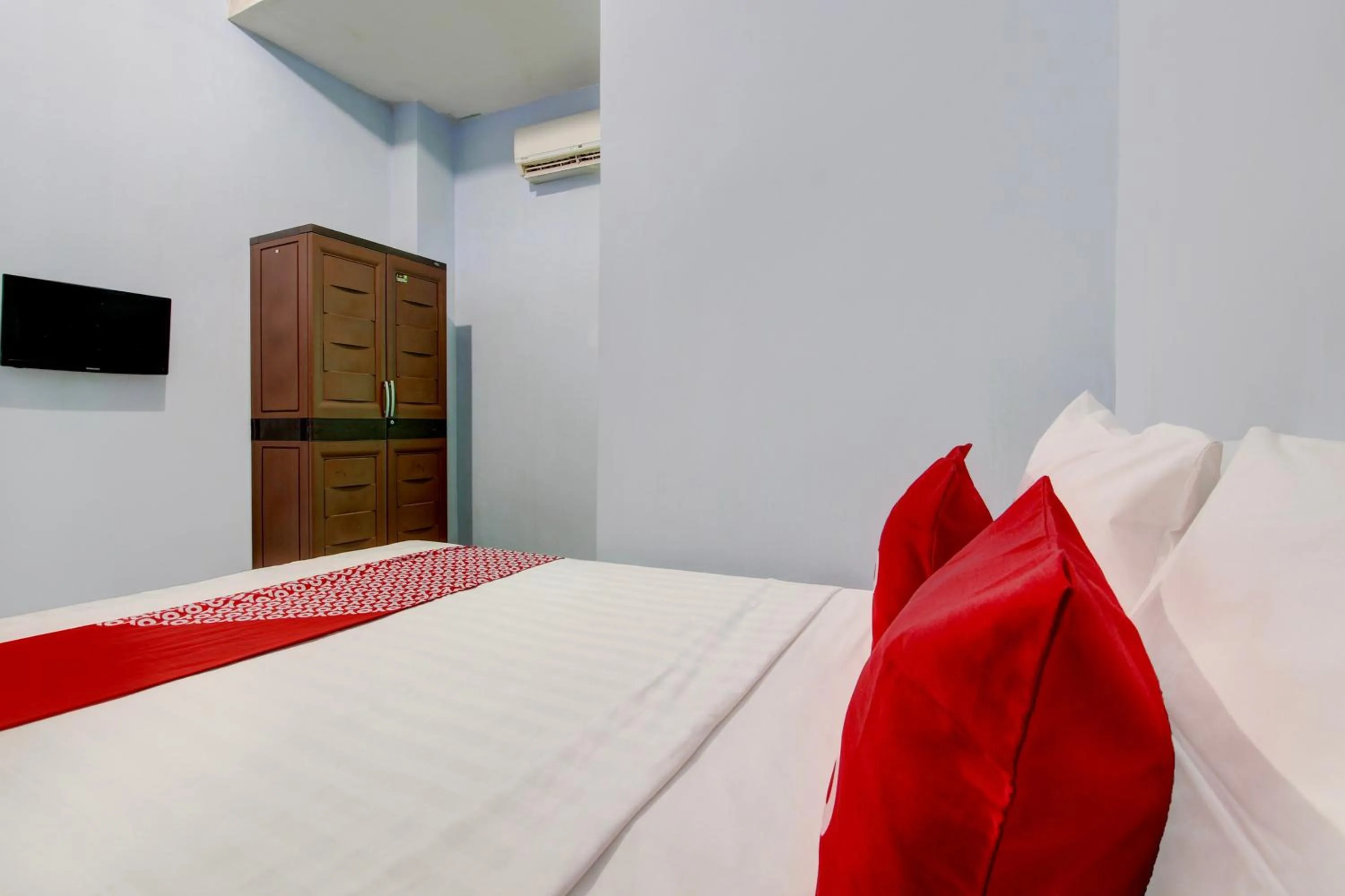 Bedroom in Hotel O Minso Inn Sepanjang