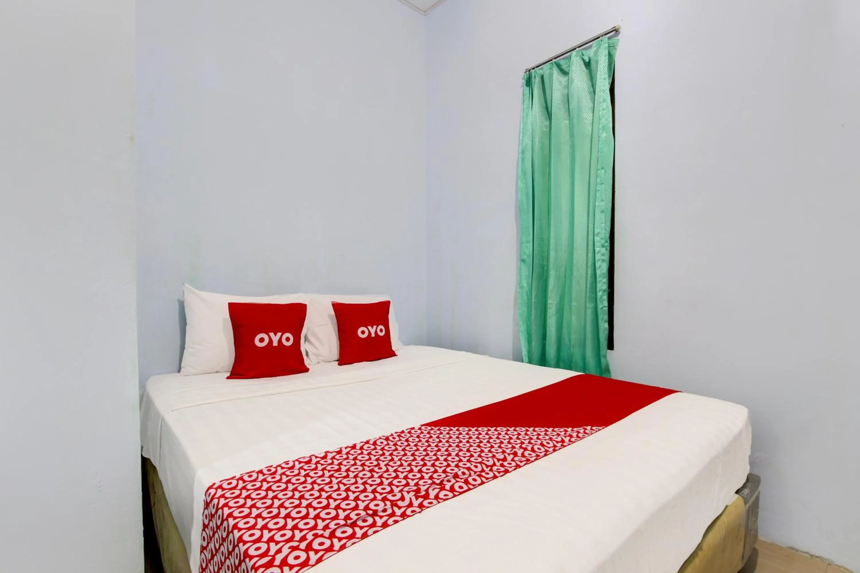 Bedroom in Hotel O Minso Inn Sepanjang