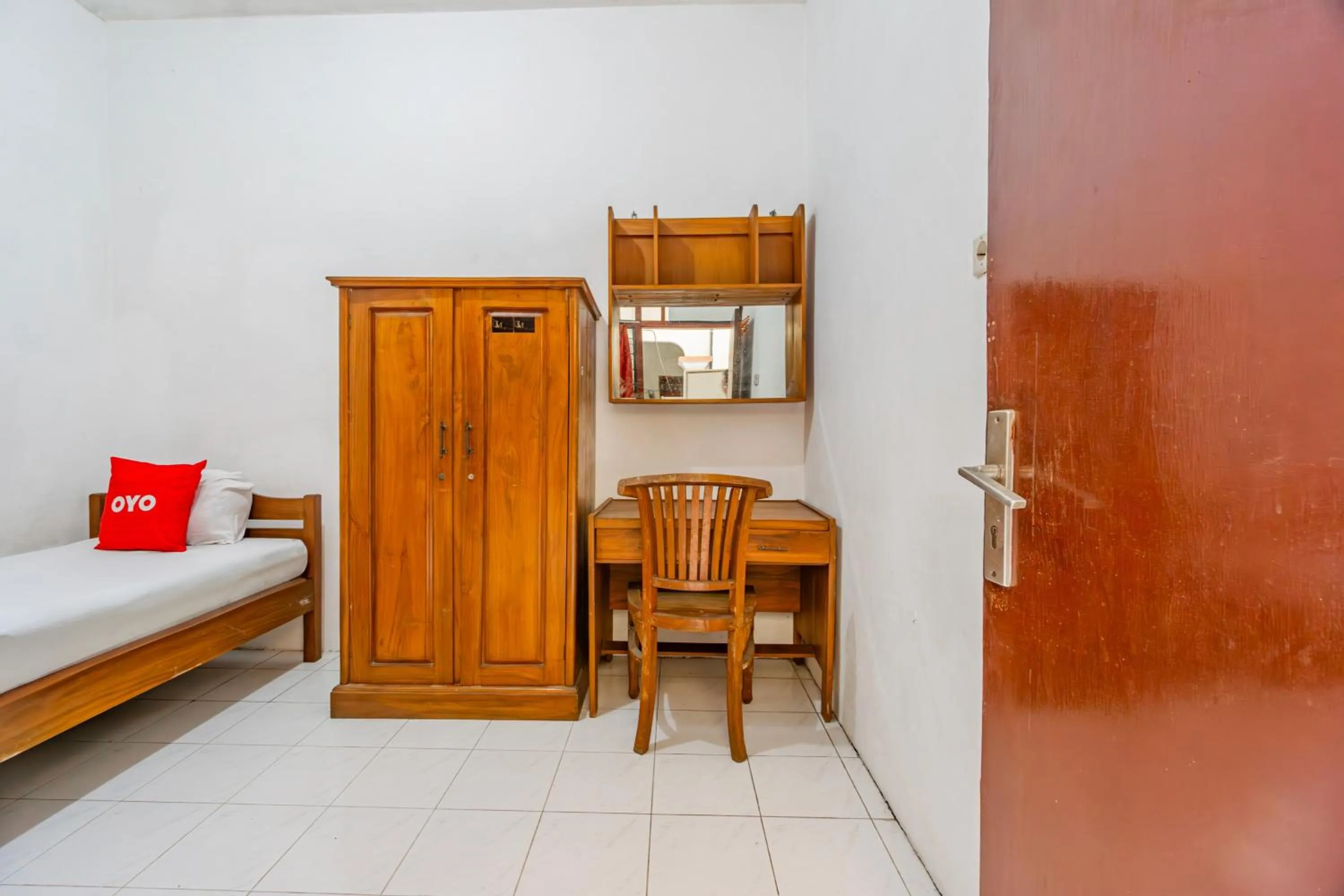 Bedroom, Bed in Hotel O Regina Homestay Syariah