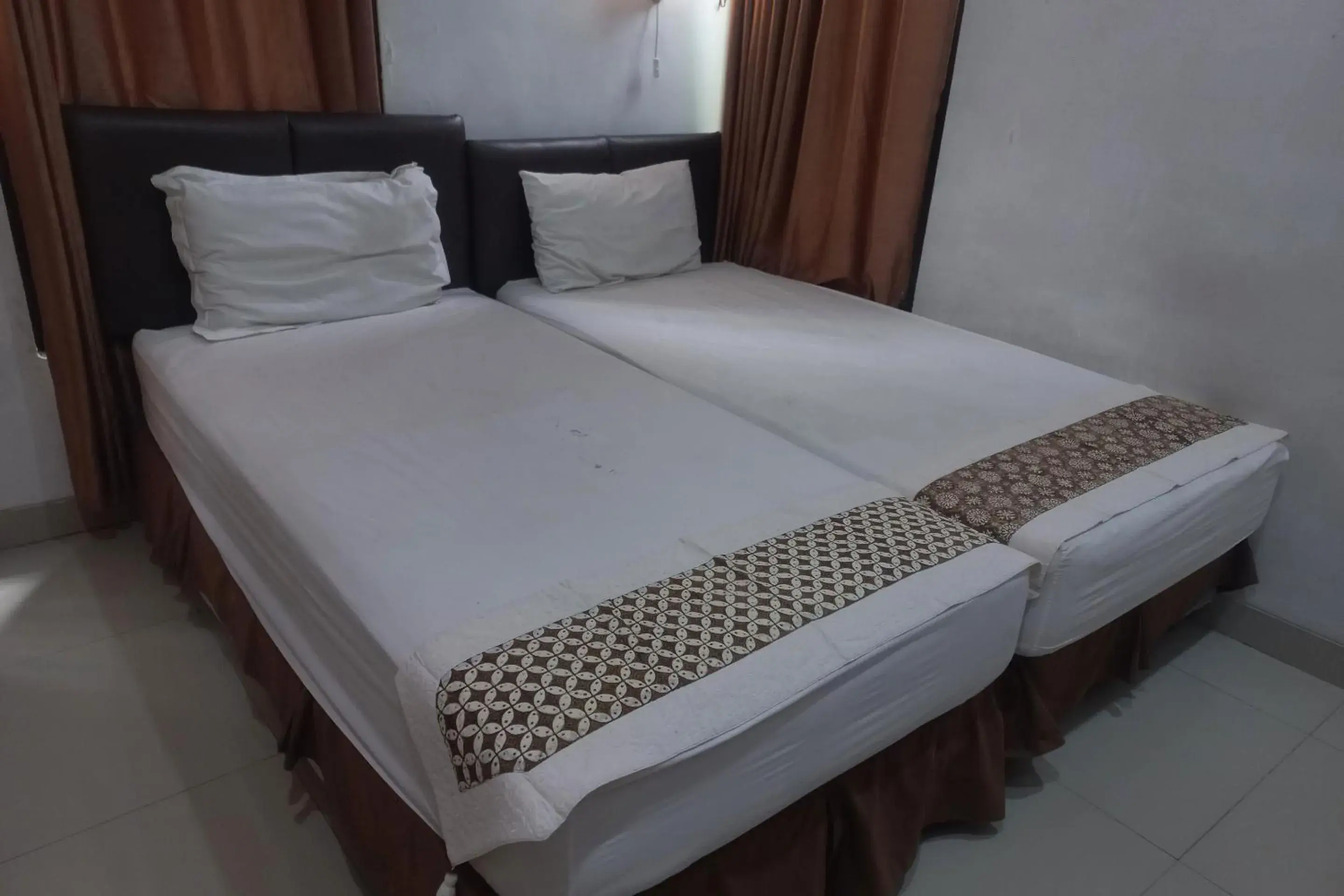 Deluxe Double Room in Capital O 93872 Natura Guest House Syariah Near alun alun kota purwokerto Deluxe Double Room in Capital O 93872 Natura Guest House Syariah Near alun alun kota purwokerto